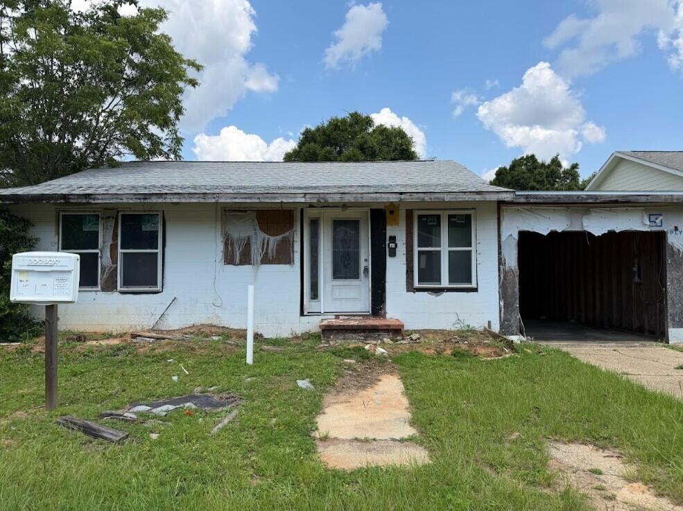 Investor Opportunity - Renovation, Rebuild, or Redevelopment Potential

Positioned in a highly accessible Pensacola location, this 3-bedroom, 2-bath property presents a compelling opportunity for investors, builders, or experienced renovators. The home features an eat-in kitchen, covered carport, and a sizable backyard, offering a flexible footprint for renovation or expansion. A detached utility workshop adds further value, with potential for conversion into a guest suite, studio, or additional functional space--or removal to maximize lot utilization for new construction.

Recent improvements include a 2021 roof, New Windows, New Doors, and shower inserts(all pictured).  The seller will also provide engineered plans and a survey (valued at $5,000) with an accepted offer, offering a significant head start for redevelopment or permitting.

Ideally located just 5 minutes from downtown Pensacola, 8 minutes to Publix, and 15 minutes to Pensacola Beach, this property combines convenience with strong upside potential.

Property is being sold AS-IS. Seller will make no repairs. All measurements are approximate and should be independently verified by the buyer.