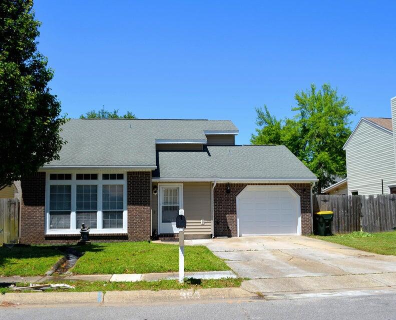 Two-story home with a split floor plan and one car garage. Master bedroom is downstairs and spare bedrooms are upstairs with a second full bath. Wood floors throughout, aside from the stairs, which are carpeted. The living room features floor to ceiling windows for lots of natural light. The kitchen has stainless steel appliances, to include a gas stove. The backyard is completely fenced in. Walking distance to elementary, middle, and high schools. Seconds from HWY 98. Sorry, pets are not negotiable. All Coastal Realty Services residents are enrolled in the Resident Benefits Package (RBP) which includes renters insurance, HVAC air filter delivery (for applicable properties) and our best-in-class resident rewards program, and much more!