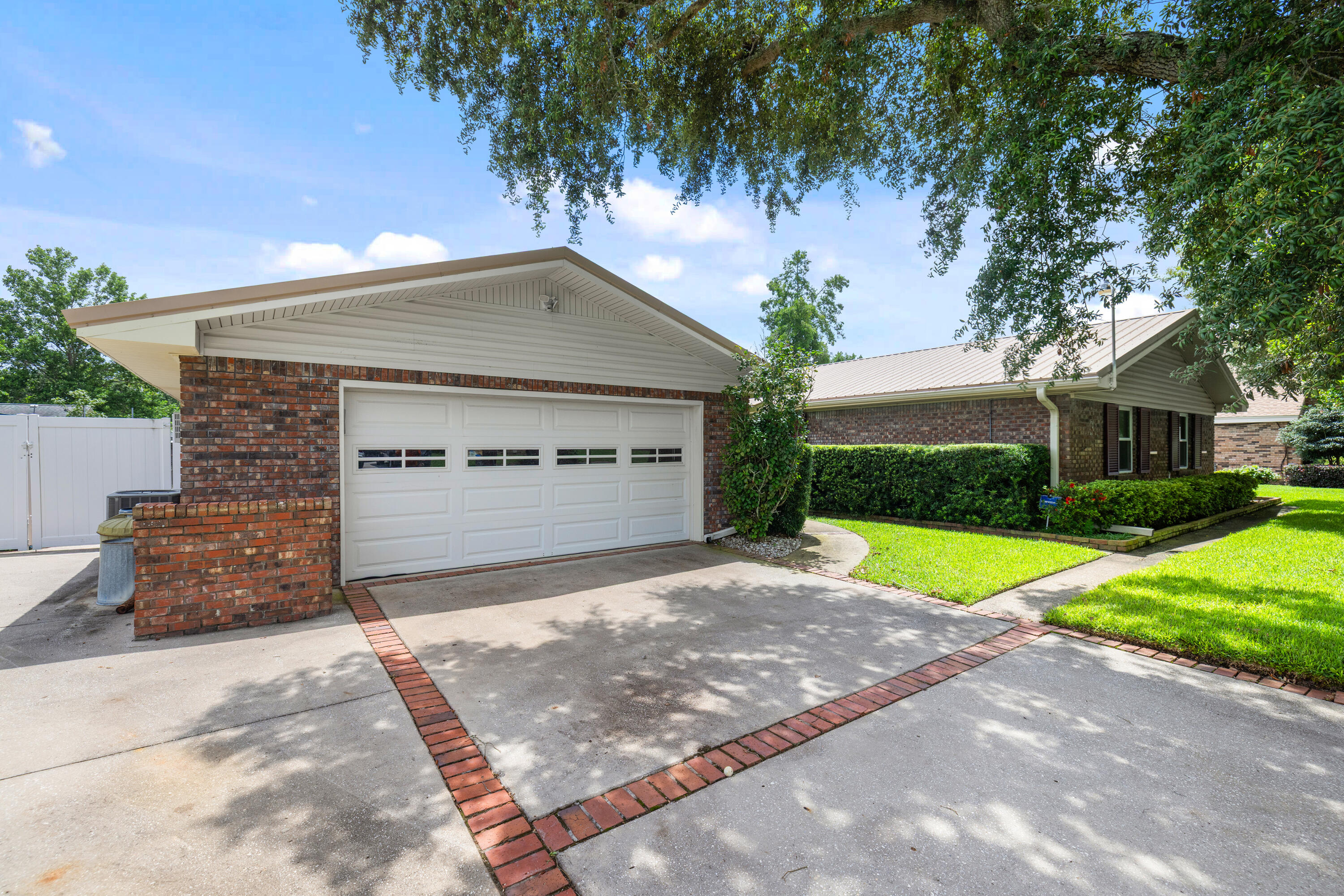 Some homes are bought for the finishes.
This one is bought for the space, the location, and the chance to make it yours.
21 Pebble Beach Drive in Shalimar gives you the pieces buyers keep asking for: 4 bedrooms, 2.5 baths, a private office, a formal dining room, an expanded kitchen, and an expanded garage. There is real room here. Not just square footage on paper, but usable space for work, family, storage, projects, and everyday living.
Outside, the yard tells its own story. Roses. Gardenias. Mature landscaping. A lawn so thick it feels like walking across a memory foam mattress.
This is the kind of home that does not need to pretend. It has the location. It has the layout. It has the garage space. It has the garden. What it is looking for now is its second owner. Someone who sees the bones, the setting, and the opportunity, then makes the updates they want instead of paying for someone else's choices.
If you want Shalimar, space, and a home you can make your own, this is the one to see.