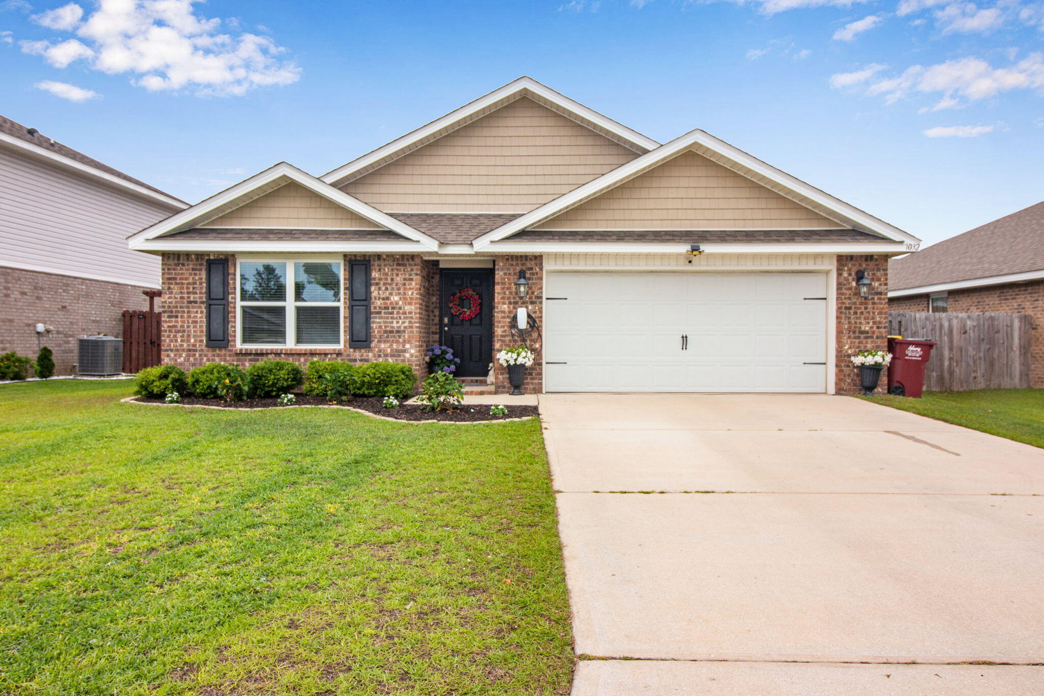 Well-maintained Cali floor plan located in the sought-after Redstone Commons community, offering a functional layout with thoughtful upgrades throughout. This full brick home features durable LVP and laminate flooring, an open-concept design, and abundant natural light.

The kitchen serves as the heart of the home with granite countertops, a large center island perfect for casual dining, stainless appliances, and ample cabinetry. The walk-in pantry has been enhanced with custom wooden shelving for added organization and style. The kitchen flows seamlessly into the main living area, creating a comfortable space for everyday living and entertaining. The master suite offers a spacious layout with a double vanity, walk-in shower, and generous closet space. Additional bedrooms are well-sized and provide flexibility for guests, office, or hobby use.

Throughout the home, updated wainscoting adds character, while added cabinetry in the laundry room provides extra storage and functionality and freshly painted walls with the exception of the master. 

Step outside to a covered back patio overlooking a fully fenced backyard with an extended concrete pad, ideal for outdoor seating, grilling, or entertaining. The patio has been upgraded with a durable epoxy finish, and wiring for a Tesla charging station has been installed for added convenience.

Additional features include public sewer and electric utilities, central heating and cooling, ceiling fans, smoke detectors, and garage door opener.

Enjoy access to Redstone Commons amenities including community pool, playground, and common areas, all conveniently located near shopping, dining, and local bases.
