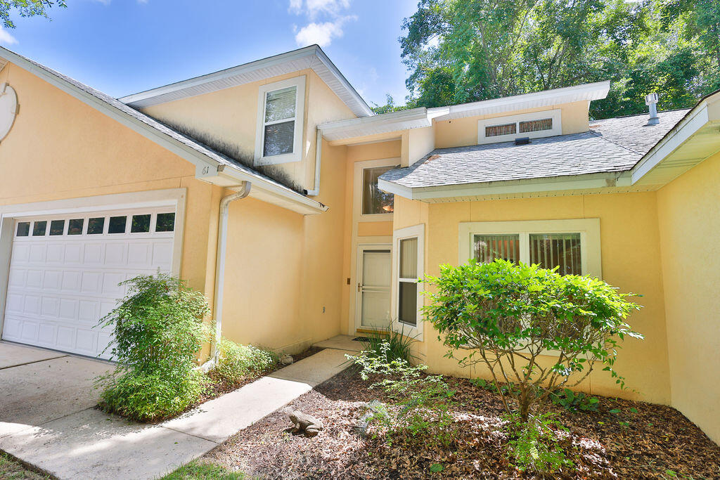 Discover the perfect blend of comfort, convenience, and coastal lifestyle in Marina Cove Village, one of Bluewater Bay's most desirable waterfront communities. Nestled along the shores of the bay in Niceville, this spacious townhome offers the room and functionality of a larger single-family home while providing the low-maintenance lifestyle that makes townhome living so appealing.

Inside, you'll find a thoughtfully designed floor plan featuring a spacious first-floor primary suite, offering convenience and privacy. Upstairs are two additional oversized bedrooms along with a versatile bonus room that can easily serve as a home office, media room, playroom, or additional guest space.

The main living areas are designed for both everyday living and entertaining, featuring separate living and dining spaces, a large kitchen with abundant storage and workspace, and a screened lanai overlooking a private yard area. Whether you're hosting family gatherings or enjoying a quiet evening at home, the layout provides flexibility and comfort.

One of the home's standout features is the full two-car garage--a rare and highly sought-after amenity that offers ample room for vehicles, golf carts, recreational equipment, and additional storage.

Life in Marina Cove Village extends well beyond your front door. Residents enjoy access to a private waterfront dock and sitting area where you can relax and take in stunning bay views, watch the boats come and go, or simply enjoy Florida's beautiful sunsets. Just steps away, Bluewater Bay's full-service marina provides convenient boating access, while the community's renowned golf courses, tennis facilities, walking paths, parks, and recreational amenities create an unmatched quality of life.

Located just minutes from the white-sand beaches, world-class dining, shopping, and entertainment of Destin, this home offers the perfect balance of peaceful bayfront living and easy access to the Emerald Coast's most popular destinations.

If you've been searching for the space of a larger home without the maintenance responsibilities that come with it, this Marina Cove Village residence presents a rare opportunity to enjoy waterfront community living at its finest.