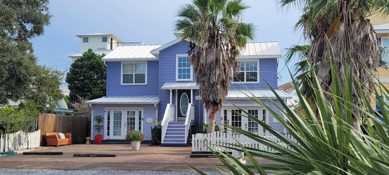 Just a short walk to the beach with private deeded beach access and no HOA. This unique Frangista Beach property is ultimately flexible - set up for personal use, multi-generational living and/or house hacking. The property's current format includes the owner's ground-floor 1-bedroom, 1.5-bath primary residence with its own full kitchen, a 2-bedroom, 2-bath upper residence with a full kitchen and private deck, and a separate studio with a bath and kitchenette. Each space has its own HVAC system, hot water heater, private entrance, and outdoor areas, providing flexibility and privacy for owners and guests alike. Sold fully furnished, with some exceptions in the owners' personal residence, brick paver outdoor living spaces, a fenced 50' x 100' lot,  parking for up to five vehicles, a Level 2 EV charger, and a full RV hookup with 30-amp/50-amp electric, water, and sewer.  this is a truly rare opportunity to own one of the most versatile properties near the Gulf, in one of Miramar Beach's most desirable neighborhoods. Available for Sale through August 2026.