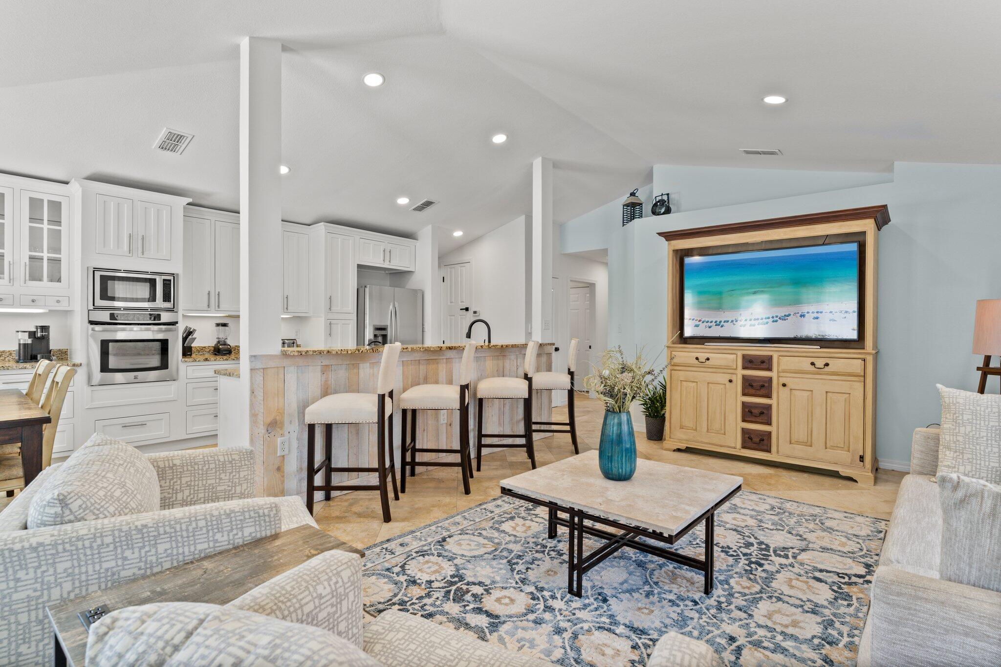1 of only 5 homes in Destin & Miramar Beach with a pool under $1M.  Over $100k in short term rentals for same size homes in the neighborhood! Golf Carts Allowed!  Deeded beach access and 320' of private beach area make this coastal retreat a rare find! Located in the private gated Paradise Retreat neighborhood just down the street from the white sandy beaches, this fully furnished, turn-key ready home also boasts a brand-new pool and deck installed in 2024, surrounded by beautiful pavers that extend around the entire home. The backyard features a spacious pavilion equipped with electricity - perfect for outdoor entertaining, lighting, or even setting up an outdoor kitchen and TV area. Whether you're seeking a primary residence or a short-term rental (sleeps 8), this property offers the best of both worlds. Inside, the inviting open-concept layout features vaulted ceilings,
stylish wood-look tile flooring, and a kitchen designed for hosting with an entire wall of cabinetry, stainless steel appliances, and a large center island that is perfect for entertaining.

The home includes three bedrooms and two bathrooms: a master suite with a king bed and double vanity ensuite, a second guest bedroom also with a king bed, and a third guest bedroom equipped with double bunk beds-perfect for kids or extra guests. The guest bathroom features a tub/shower combo and a new vanity.

Additional highlights include a separate laundry room, two-car garage with built-in cabinets and an entertainment center with a mini fridge and wine rack. This move-in-ready gem combines laid-back beach living with all the features you need for comfort, entertaining, and investment potential.

It is located right off Scenic Highway 98 which provides the ultimate golf cart lifestyle. Cruise along this beautiful scenic route to popular local favorites like Camille's, Crab Trap, Captain Dave's, and Pompano Joe's, or grab your coffee and head to the sand for sunrise.