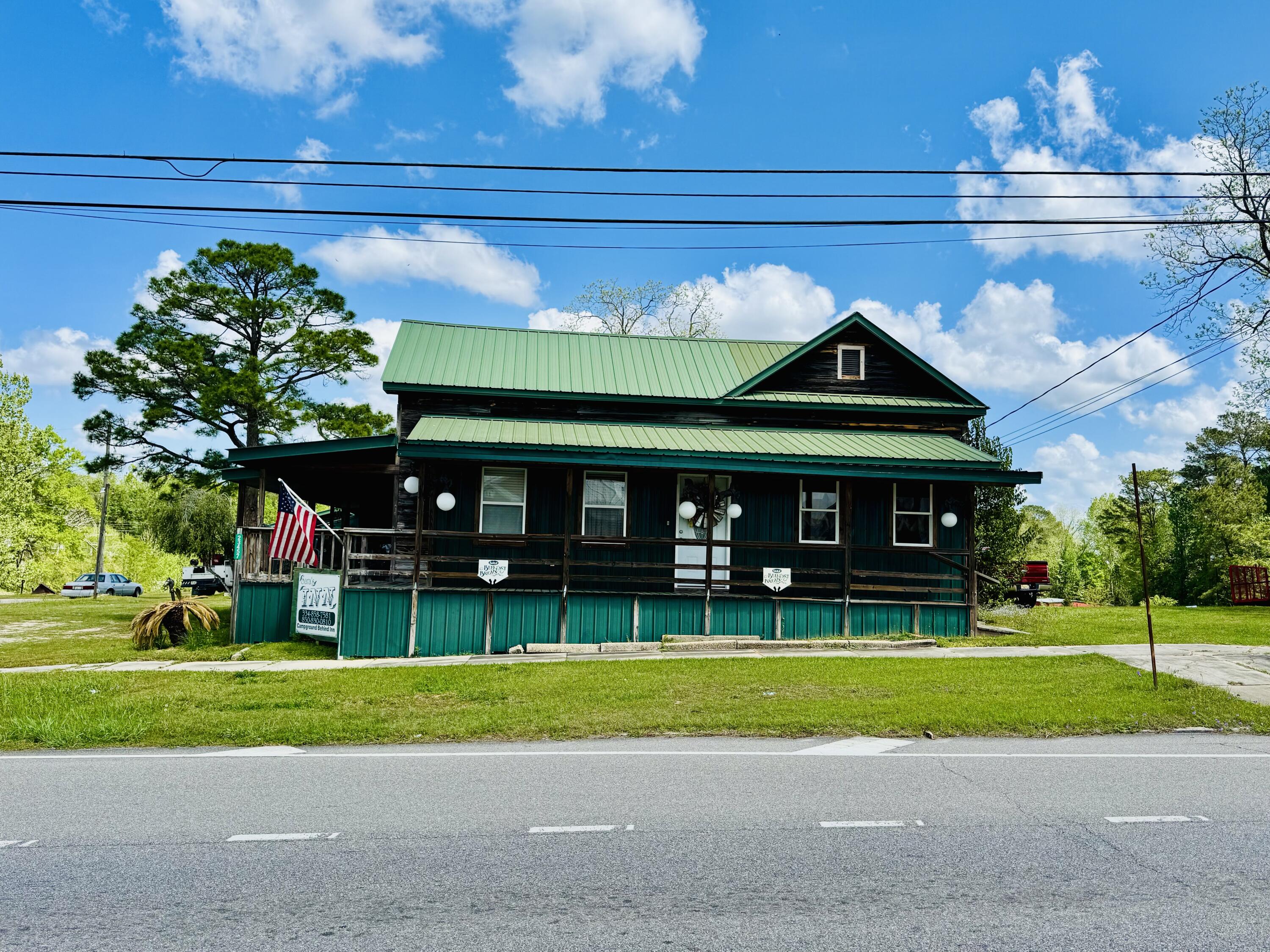 This unique property is positioned in the heart of Florala, Alabama, and directly across from the scenic beauty of Lake Jackson.
The main residence operates as a well-established bed and breakfast, featuring four spacious bedrooms with private bathrooms, along with a fully equipped kitchen designed to accommodate guests comfortably. Just behind the main home, an additional structure provides four more guest rooms, each with its own private bathroom--ideal for expanding lodging capacity or hosting larger groups.
The property also includes a fully functional campground with 14 sites equipped with 50-amp RV hookups, catering to the growing demand for RV travel and outdoor recreation. Guests of the campground enjoy convenient access to two bathhouses, a dedicated laundry facility, and a