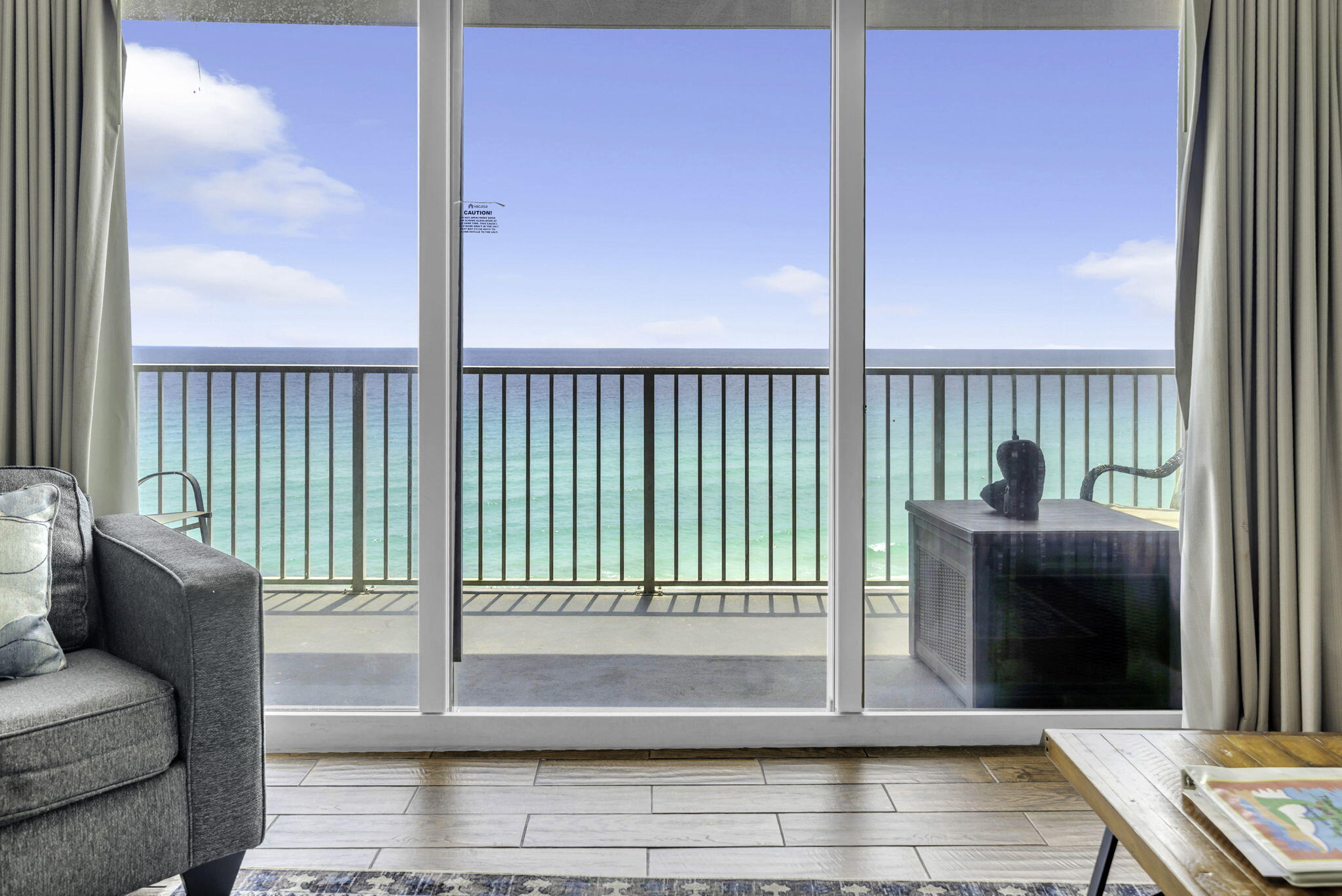 Take advantage of this rare opportunity to own a desirable low-floor condo on the west end of Tidewater Beach Resort. Situated on the 6th floor, this spacious 2-bedroom unit also features a bunk room and 3 full bathrooms, offering excellent flexibility for guests and strong rental potential.

The open-concept living, dining, and kitchen areas are designed to showcase beautiful Gulf views, filling the space with natural light and a true coastal feel. The interior offers hard surface flooring throughout--no carpet--and includes stainless steel appliances for a clean, updated look. Step out onto the private balcony and enjoy stunning Gulf views from a level that perfectly balances scenery and convenience. Low-floor units are highly sought after for their ease of access--skip long elevator waits and take advantage of the option to use the stairs when you choose.

Offered fully furnished, this condo is turnkey and ready for immediate enjoyment as a second home or income-producing rental.

Residents and guests of Tidewater enjoy an impressive lineup of resort-style amenities, including multiple Gulf-front pools, a heated indoor pool, hot tubs, a well-equipped fitness center with Gulf views, sauna and steam rooms, an on-site restaurant and bar, movie theater, game room, and private beach access.

Ideally located near Pier Park, The Back Porch Seafood & Oyster House, Sharky's Beachfront Restaurant, and Northwest Florida Beaches International Airport, this property offers the perfect combination of convenience, lifestyle, and investment potential.