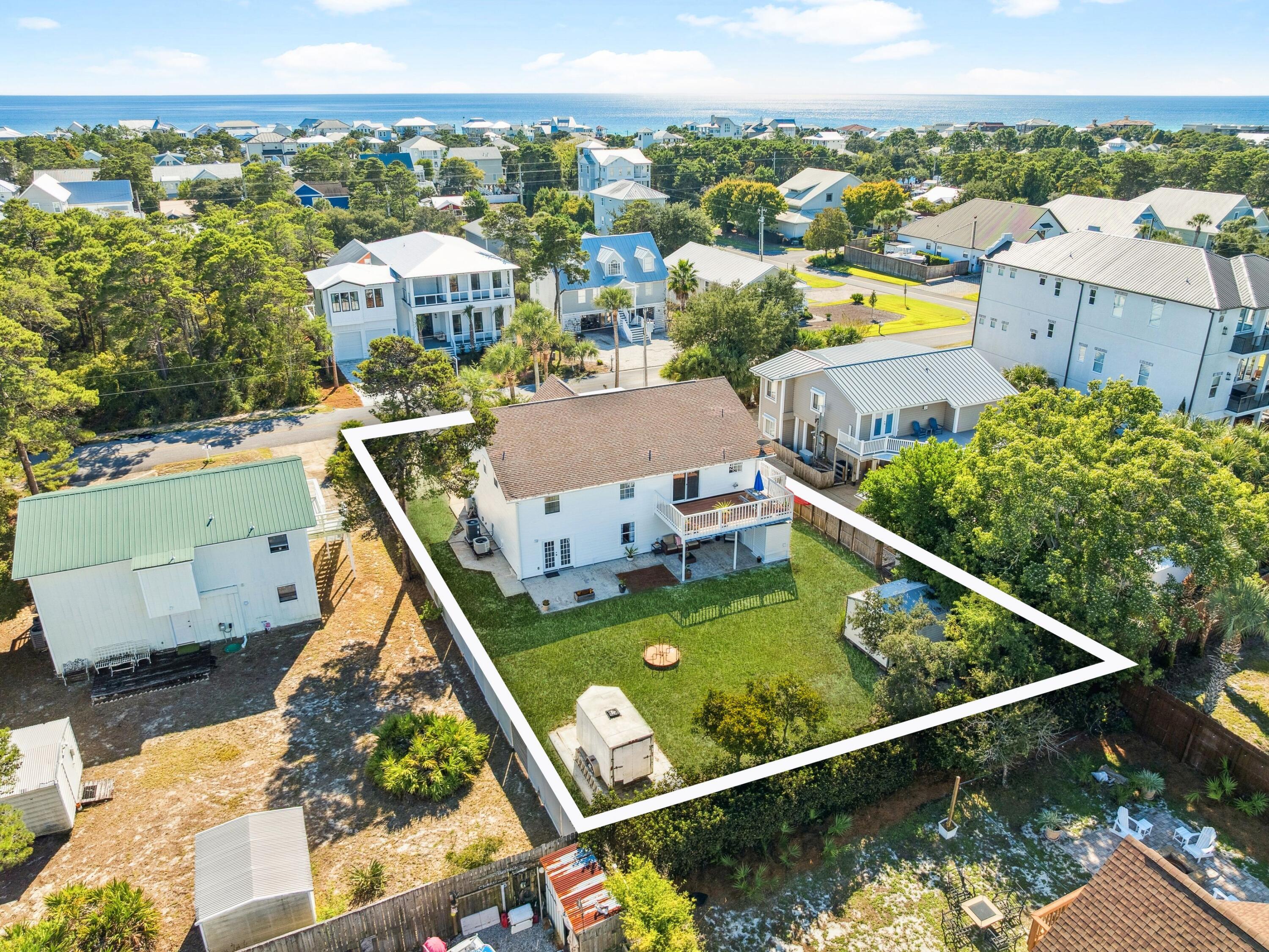 Back on the market no fault to the seller. 
Location. Location. Location. 
 Just one block off Scenic Highway 30A and moments from the sugar-white sands of Gulfview Heights Beach, this rare coastal retreat offers versatility, space, and investment potential in equal measure. Set on an oversized lot with room to add a pool or guest house, The property has the option two fully independent living levels--each with its own kitchen, private entry, parking, HVAC, and electric meter--making it ideal as a duplex, a rental opportunity, or a single-family home with extended living. Both floors are accessible from either the interior or exterior of the home. Depending on your needs, this five-bedroom, three-bath layout also includes a large office and generous gathering spaces both upstairs and downstairs An enclosed gulf-side porch and an expansive north-facing deck invite coastal breezes and easy entertaining, while recent updates, fresh interior and exterior paint, new water heaters, upgraded appliances, and whole-home water filtration system , underscore the home's move-in readiness. Additional features include a circular driveway, a central vacuum system on both floors, a storage shed, a large walk around attic space makes for endless possibilities, and a whole-home termite bond. This beautiful home is truly move-in ready, offering both comfort and convenience from day to day. 
Situated on the quiet west end of 30A between Dune Allen and Blue Mountain Beach, the property enjoys quick access to Ed Walline Regional Beach Access and the Longleaf Greenway trail into Point Washington State Forest. Shops, restaurants, and entertainment at Gulf Place are within walking distance, and a six-seat street-legal golf cart is included for effortless exploration of 30A. With no HOA fees, this home offers an exceptional opportunity to enjoy, rent, or reimagine one of the most flexible properties along the Emerald Coast.