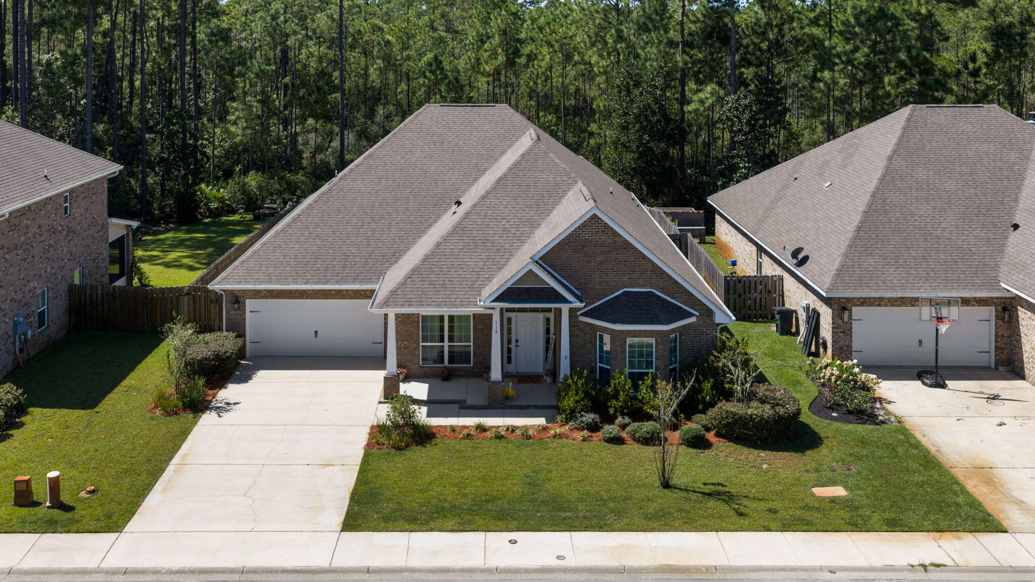 Flood insurance not required! Fresh, spacious, and minutes from both the beach and the bay, 110 Conner Circle offers nearly 3,200 square feet of single story living in the desirable Peach Creek community. Built in 2020, this all brick home features 5 bedrooms, 3 full baths, plus a large flex space and has recently been refreshed by the sellers with fresh paint and additional touch ups throughout. The result is a bright, clean, move in ready home with plenty of room to spread out. The large flex space at the front of the home gives you options for a home office, playroom, workout room, media room, or additional guest space and could potentially function as a sixth bedroom. The heart of the home is the open living and kitchen area, offering plenty of space for everyday life and entertaining. The kitchen features granite countertops, painted cabinetry, and generous gathering space. Luxury vinyl plank flooring flows throughout the main living areas, complemented by designer lighting and brushed nickel fixtures. Outside, the spacious backyard offers even more possibilities with plenty of room to enjoy the Florida lifestyle and great potential for a future pool. The location brings it all together. Enjoy easy access to the beaches of 30A, Choctawhatchee Bay, boating, paddleboarding, shopping, dining, and everything Santa Rosa Beach has to offer. Five bedrooms, nearly 3,200 square feet, single story living, and minutes from both the beach and the bay. Schedule your tour today.