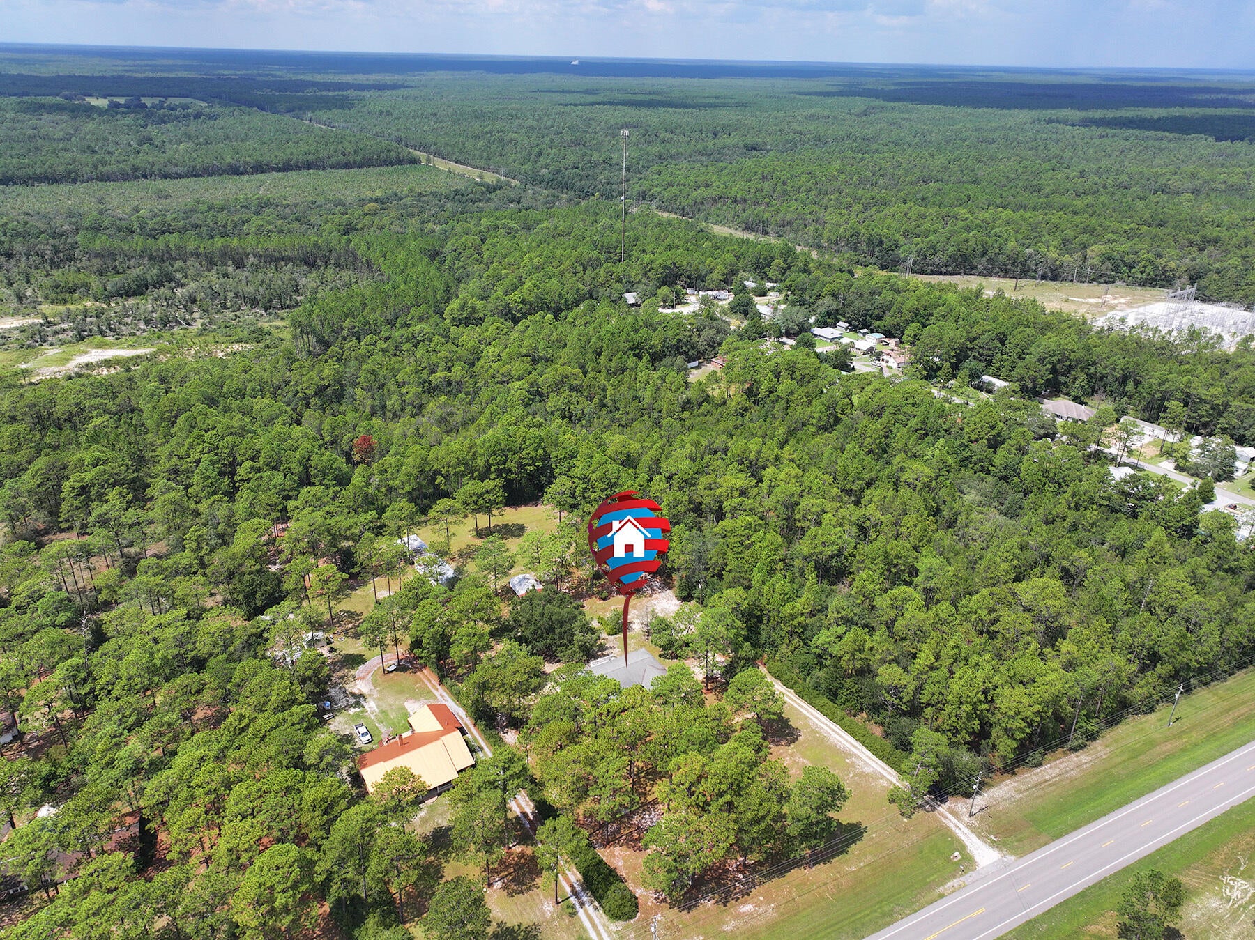 House and 5.4 acres.  Sellers are motivated. Bring offers! On Business Highway 331 in Freeport, Florida. City of Freeport is recognized as one of the fastest growing cities in the State of Florida. Property consists of 5.4 acres with approximately 240 feet of highway frontage of Business Highway 331. Zoned R-3 High Density Residential plus a flood zone rating of X will accommodate up to several units per acre for future development as per City of Freeport land use guidelines. City water, city sewer and power are available. Three schools, Freeport Elementary, Freeport Middle School and Freeport High School are located within 2 miles of this property. New middle school being built in Hammock Bay is less than 4 miles away. This property features a 2500 square foot custom home that has been  meticulously maintained. Large open yard and grounds are ideal for large family gatherings, children and pets.  Recent upgrades to the house include a complete renovation to the kitchen which includes new cabinets/countertops, flooring and appliances. New paint and flooring in most rooms. There are two large sheds that can accommodate multiple cars, boats, tractors and equipment.  This unique house and property is located just 20 minutes for the Beaches of South Walton, 30 minutes from Eglin Air Force Base and only 15 minutes from Interstate 10 and DeFuniak Springs, Florida.  Freeport Industrial Park with multiple businesses is located approximately 1/2 mile from this property.  There are multiple parks and boat launch facilities for your recreational pleasures within minutes of this location.