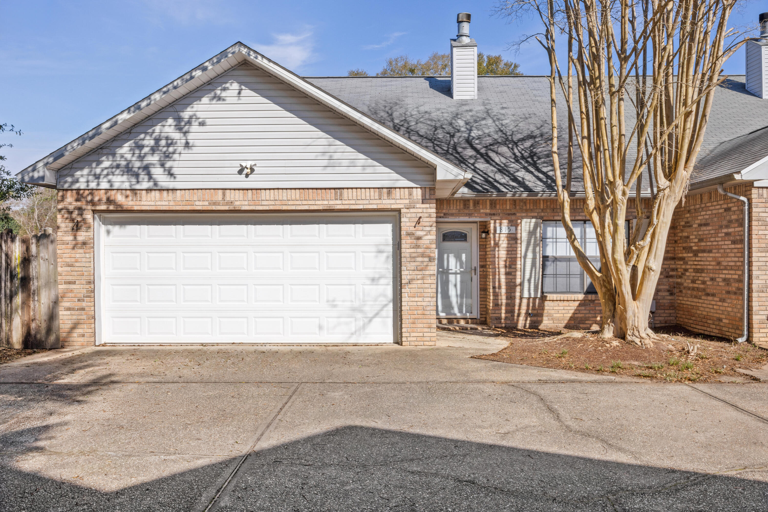 Available Now!  Check out this well maintained 3 bedroom, 2 1/2 bathroom, 2 car garage townhome conveniently located close to schools and shopping.  The home has recently been painted and new carpet installed  in the bedrooms and stairs.  The home features cathedral ceilings and fireplace in the large living room, with nice sized galley style kitchen, and a first floor master bedroom suite.  The upstairs features 2 nice sized bedrooms with ample closet space and a full bath.  The large deck off the back of the unit is perfect for entertaining.  Schedule your showing today!