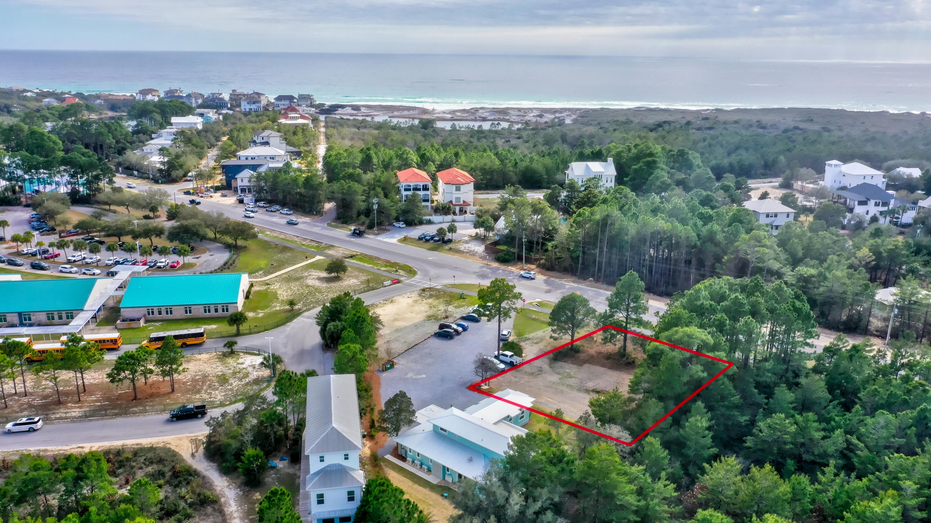 Positioned along Scenic Highway 30A with exceptional road frontage and just a short half-mile stroll to the Gulf, this 0.30-acre lot offers a compelling opportunity for creative development. Designated Village Mixed Use, the property allows for a blend of commercial and residential uses, making it ideal for those seeking versatility in a highly desirable coastal corridor. Located near Van Butler Elementary and roughly one mile from Topsail Hill Preserve State Park, the site also provides convenient access to Highway 98 for ease of travel beyond 30A. 

This parcel lends itself beautifully to a well-executed mixed-use vision, such as:
• Street-level retail or professional space designed to engage foot traffic
• Two private residential residences above