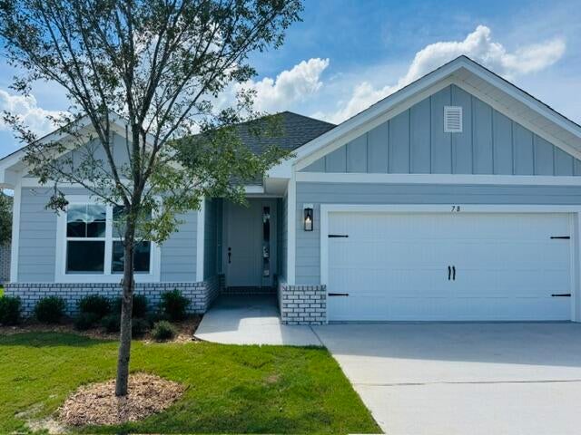 This popular Craftsman-style 3BR/2BA home (currently under construction: (Est. August / Sept. N ext to the entrance of the community (next to model). Designed with both comfort and style in mind, the home features HardieBoard® siding with a brick skirt, vaulted ceilings,  and CoreTec Pro Plus luxury vinyl plank flooring throughout--no carpet. The spacious primary suite boasts elegant tray ceilings, a generous walk-in closet, and a spa-inspired bath. Quartz countertops in the kitchen and baths, soft-close cabinetry, spacious covered patio complete this inviting home, perfect for relaxed everyday living and entertaining. Bluffs residents enjoy a community pool, and bathhouse, near the Florida Trail offering plenty of opportunities to get outside and enjoy the Florida life style.  *Pics are of a similar home.*