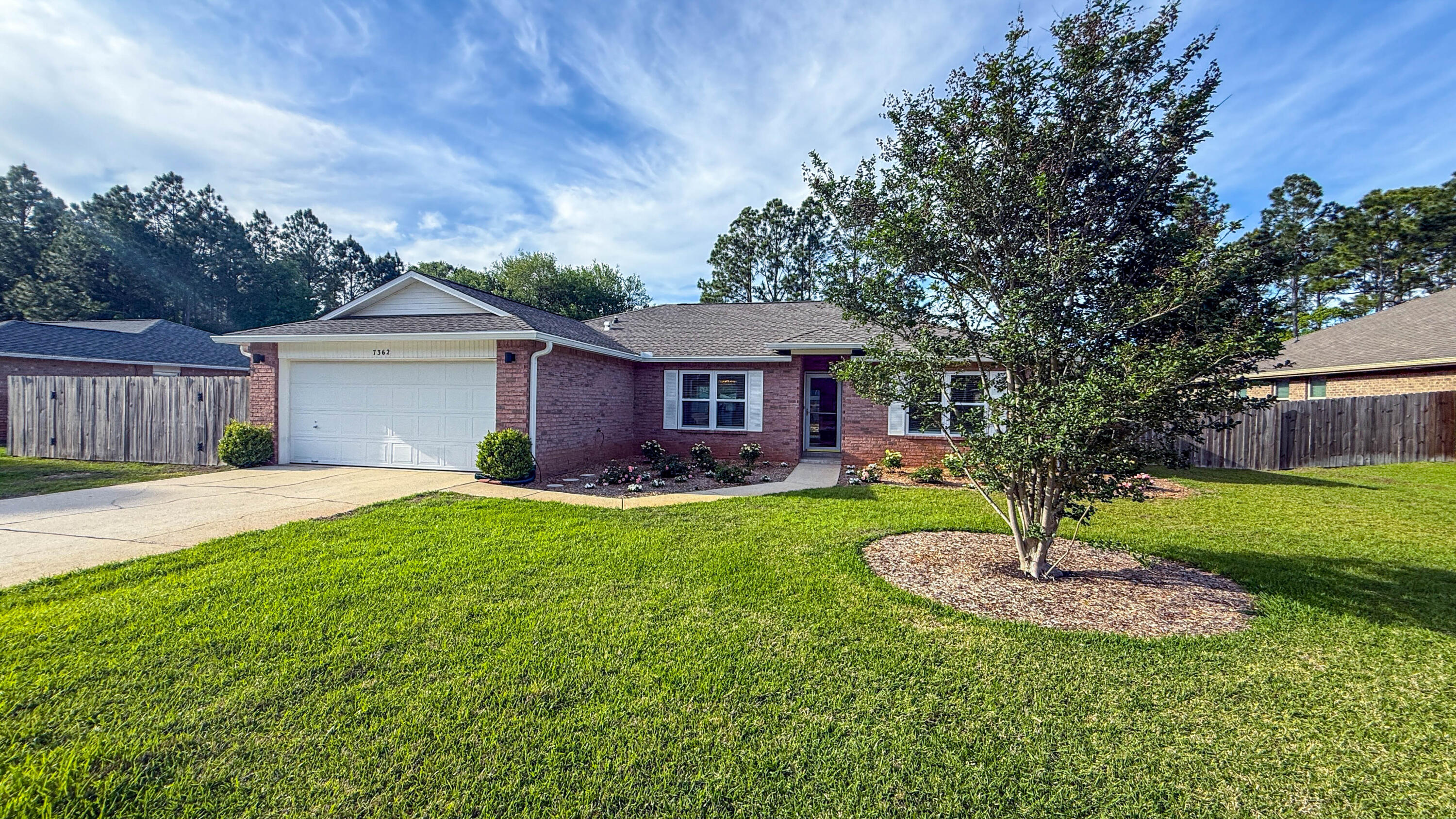 A beautifully remodeled and meticulously maintained home located in the highly sought-after Holley By The Sea community, known for its exceptional resort-style amenities including a recreation center, pools, fitness facilities, tennis courts, walking trails, fishing pond, and access to Santa Rosa Sound. 
This home has been thoughtfully upgraded from top to bottom, offering peace of mind with major system improvements and stylish modern finishes throughout. Significant improvements include: Roof replacement 2021, Water Heater 2022 & Whole home Generac generator, New irrigation pump & gutters installed in 2023, New kitchen appliances & ceiling fans throughout in 2023.
A full interior renovation was completed in 2024 featuring: Quartz countertops throughout, Custom 3/4 inch all-wood cabinetry New Work Station kitchen sink, New Delta Champagne bronze kitchen faucet, Updated electrical and garbage disposal, Water Drop reverse osmosis system, new porcelain tile flooring throughout, updated bathroom fixtures and lighting, new rear privacy fence and stovetop vent through the roof.

Additional recent upgrades include: 2025 Simonton hurricane impact windows and slider, these are Storm Breaker plus HVHZ certified and Miami-Dade rated, new lighting in kitchen and living room, and new primary shower which is curb less and wheelchair accessible. Features throughout are truly stunning!

In 2026, a full home plumbing repipe was completed bringing the plumbing system to current standards and a water filtration system was added. 

To enhance the kitchen features, a gas hookup conveniently located behind the range was completed to allow for an easy conversion.
Plenty of storage flows to the island cabinets and are easily accessible.

Enjoy the fully fenced backyard on almost a half acre, perfect for hosting family and friends, spacious for kids and pets to play and plenty of room for your future pool. 

The property also offers ample space for RV or boat parking, perfect for those who love to enjoy the coastal lifestyle. The home is connected to underground utilities along with public water and sewer for added convenience and reliability.

The home is located on a dead end street which is nice for additional privacy. 

Pest control has been maintained with Arrow. Average water/sewer $78/month and electric/gas $168/month for a family of two. 

Close to dining, shops, grocery, top rated schools, and within 15 minutes to the beautiful white beaches in Navarre. 

The Holley By the Sea boat ramp for their residents, is about 2 miles away. It offers a pavilion, boat ramp and pier for those stunning emerald coast sunsets. Making fishing trips, kayaking or paddle boarding very convenient.

This home offers both comfort and long-term value in one of Navarre's most desirable communities. 
Come see why this home on Treasure Street is so special.

WE ARE ACCEPTING BACKUP OFFERS.