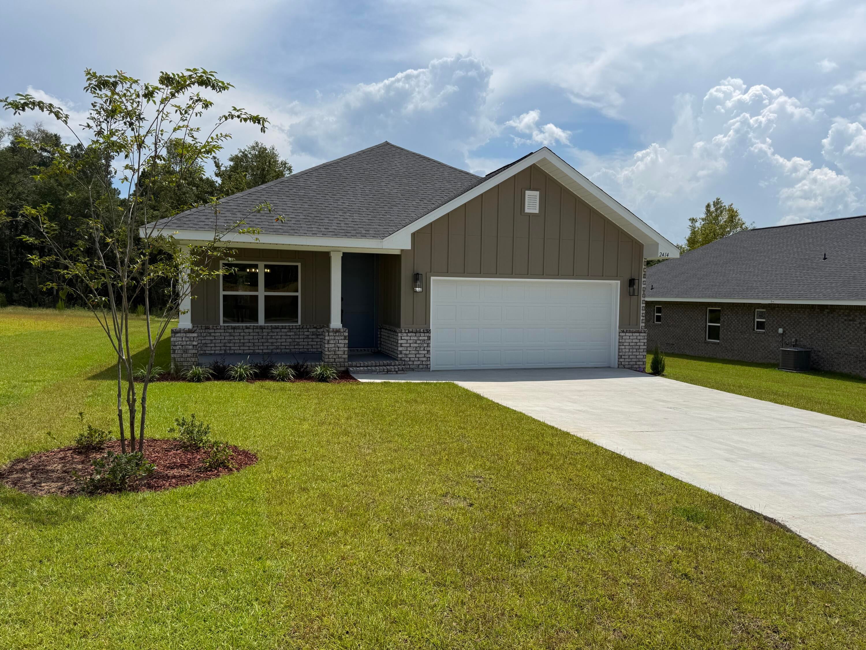 This patio home features 3 beds and 2 baths with formal dining and a back covered porch! Also included and sure to please is a tiled walk in shower with separate garden tub in the master bath! The floors boast durable LVP with carpet only in bedrooms. Cabinets are all wood shaker style. Appliances are stainless and go well with the black lighting package and hardware. Formal areas have bull nosed corners and all rooms have 5 1/4 inch baseboards. Situated throughout the home are energy saving LED recessed lighting. Vanities in both bathrooms are 36' high and the master bath has dual vanities. The exterior is Hardie on the front with brick skirting and 3 sided brick. The lot is .5 acre and comes sodded with sprinklers and a landscape package. This subdivision has only 38 homes and is well li