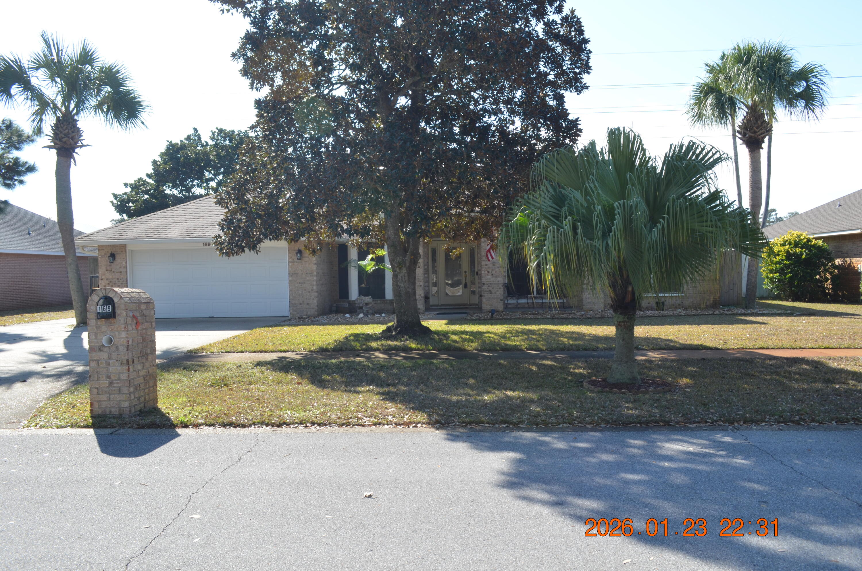 Making this your ''change of address'' gives you the opportunity to be 2-1/2 blocks from the beautiful Destin Beach!
With this fantastic location comes:
 *2,200 sq ft of an all-brick-construction ranch!
 *3 bedrooms, 2/1/2 bathrooms.
 * A bonus room just off the entry can be an office, separate dining room, or an additional bedroom.
 *Spacious Great Room that easily accommodates family and friends for visiting and dining with a brick wood burning fireplace.
 *Great Room opens to an oversized Garden Room, filled with natural light, overlooking your own salt-water pool.
 *Garden Room has access to a screened-in-patio.
 *Privacy at rear of lot -75' easement behind
 *Large Lot-80'x100'
 *2- car garage
 *Small, friendly neighborhood that is a NON-HOA community-well maintained. *Emerald Breeze subdivision is city-restricted to long-term rentals.
 *Original owner has meticulously maintained the property.
 *New roof, new water heater, new HVAC-all less than a year old.
 *Pergo flooring in foyer, Great Room, and Office (bonus room). Tile in kitchen and bathrooms.
 *Hurricane shutters included.
This is a wonderful opportunity to have a move-in ready home...close to the beach...convenient to shopping, dining, banking...easy access to main roads...yet be in a quiet neighborhood with your own piece of Florida paradise!