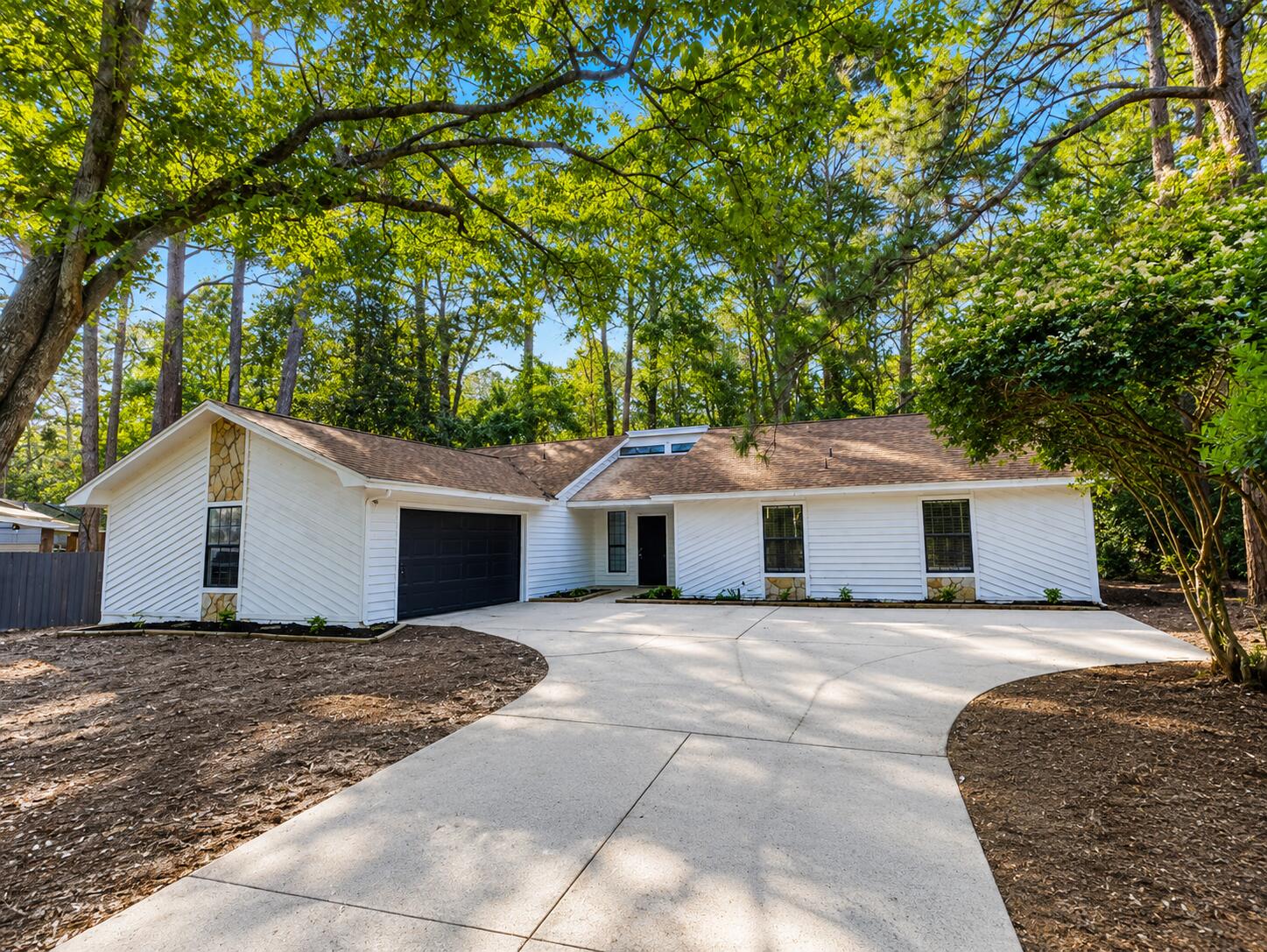 Welcome home to this 3-bedroom, 2-bath residence offering over 2,000 square feet of comfortable living space in the highly desirable Bluewater Bay community. Tucked away in a quiet cul-de-sac and backing up to peaceful wooded views, this home provides the perfect blend of privacy, convenience, and everyday comfort. Enjoy an easy commute to military bases, beautiful beaches, top-rated schools, shopping, and dining, while taking advantage of Bluewater Bay's exceptional amenities, including golf, tennis, pickleball, and swimming.

Inside, you'll find a spacious living room featuring soaring vaulted ceilings and a stunning floor-to-ceiling stone fireplace that creates a warm and inviting focal point. Sliding glass doors fill the space with natural light and open to the expansive backyard, where you can relax and enjoy the tranquil wooded setting.

The generously sized eat-in kitchen offers abundant counter space and ample cabinetry, making meal preparation and entertaining effortless. A separate formal dining room provides the perfect space for hosting gatherings or special occasions. Just off the kitchen is the laundry room for added convenience.

The spacious primary suite serves as a private retreat with a walk-in closet and an ensuite bath featuring a double vanity. Two additional guest bedrooms are generously sized and share a well-appointed second full bathroom with another double vanity. This home also includes a two-car garage. While the home still needs some updating, major improvements include a new roof in 2020, HVAC system in 2022, water heater in 2018, and fresh interior paint, updated flooring, exterior painting in 2024. 

With its desirable location, spacious layout, recent updates, and peaceful surroundings, this exceptional home is ready for its next owner. Schedule your private showing today and experience everything this Bluewater Bay gem has to offer.