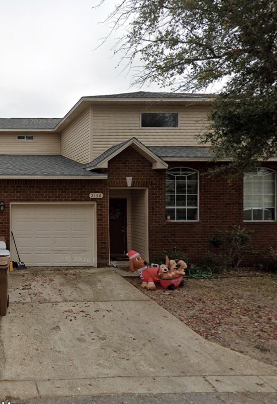 Welcome to this beautiful brick townhome located in a private, low-maintenance community where lawn care is included. Featuring 9-foot ceilings and ceiling fans throughout, this home offers a spacious and functional layout.

Step inside to a large foyer with convenient storage space. The kitchen is equipped with maple cabinetry, stainless steel appliances, a pantry, and plenty of counter space for everyday living.

The first floor includes a guest bedroom, a full bathroom, and an in-unit laundry room. Upstairs, you'll find the spacious primary suite with a private en-suite bathroom, along with a third bedroom and an additional full bathroom.

Conveniently located near shopping, dining, schools, and major commuting routes, this move-in-ready home offers comfort, convenience, and exceptional value. Schedule your showing today!