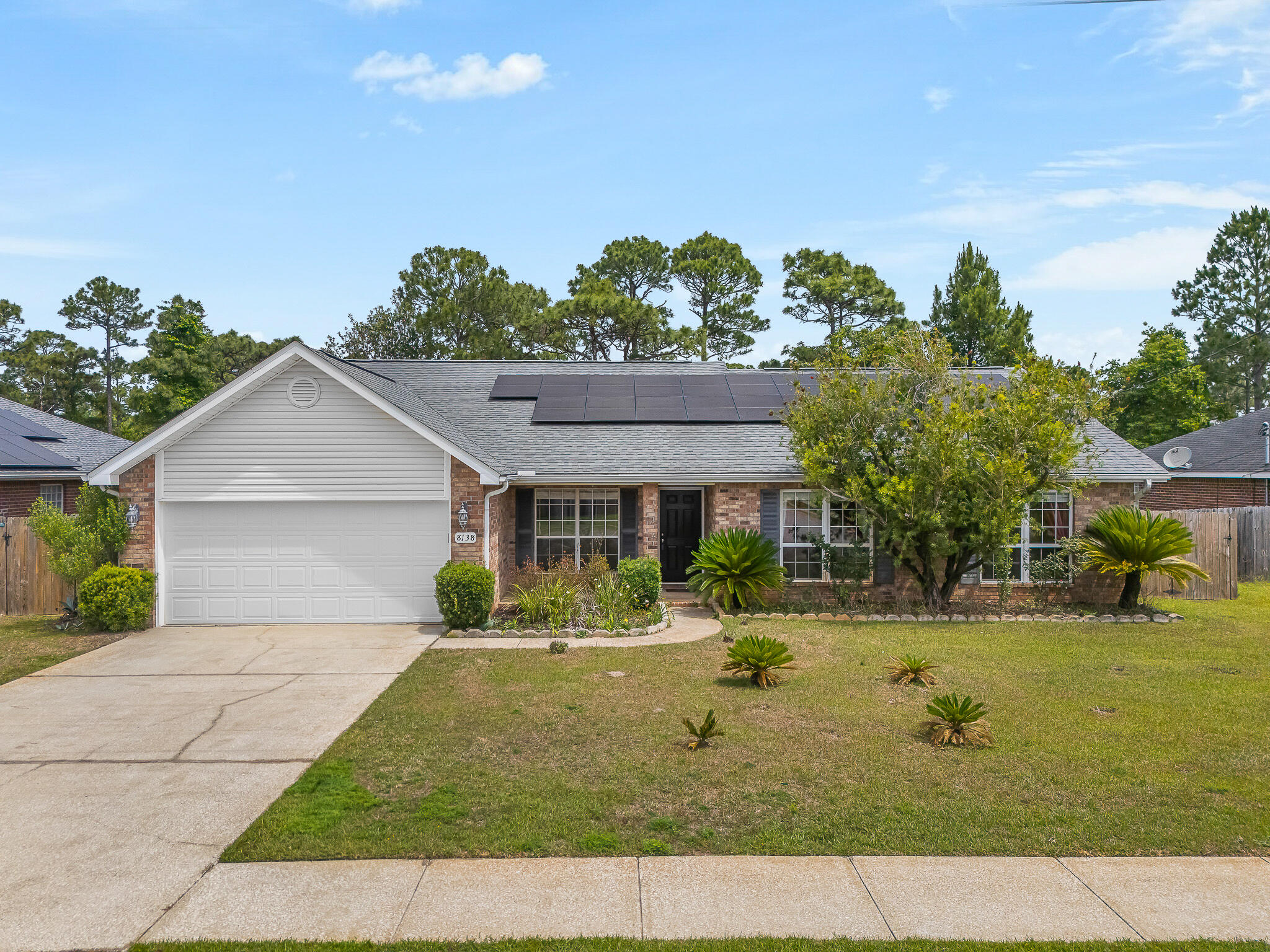 PRICE REDUCED!  

The seller has recently painted the entire interior, and new carpet is being installed soon. 

Updated professional photos and media are coming soon--stay tuned for a refreshed look at this beautiful home!  

Welcome to 8138 Cosica Boulevard -- a spacious 4-bedroom, 2-bath single-story home in the established Sky Ridge Estates community of Navarre, Florida. Built in 2006, this 2,102 sq ft residence offers a generous great room, formal dining, and an eat-in kitchen with breakfast bar and walk-in pantry.

The master suite is a true retreat, featuring a raised ceiling, walk-in closet, double vanity, and tile finishes. The newly installed shower (2023) provides a fresh, modern feel--and you'll enjoy the benefits of a therapeutic Kohler walk-in soaking tub that offers hydrotherapy massage, safety-focused accessibility, and a luxurious at-home wellness experience.

Three additional bedrooms provide flexibility for family, guests, or a home office. Recent improvements include solar panels (2022) for SIGNIFICANT ENERGY SAVINGS, HVAC system (approximately 2021), a water heater (approximately 2022), and roof (2016).

The two-car attached garage adds convenience and storage. Located just minutes from Navarre Beach, top-rated schools, shopping, dining, and area military bases, including Hurlburt Field and NAS Pensacola.

Schedule your private showing today.