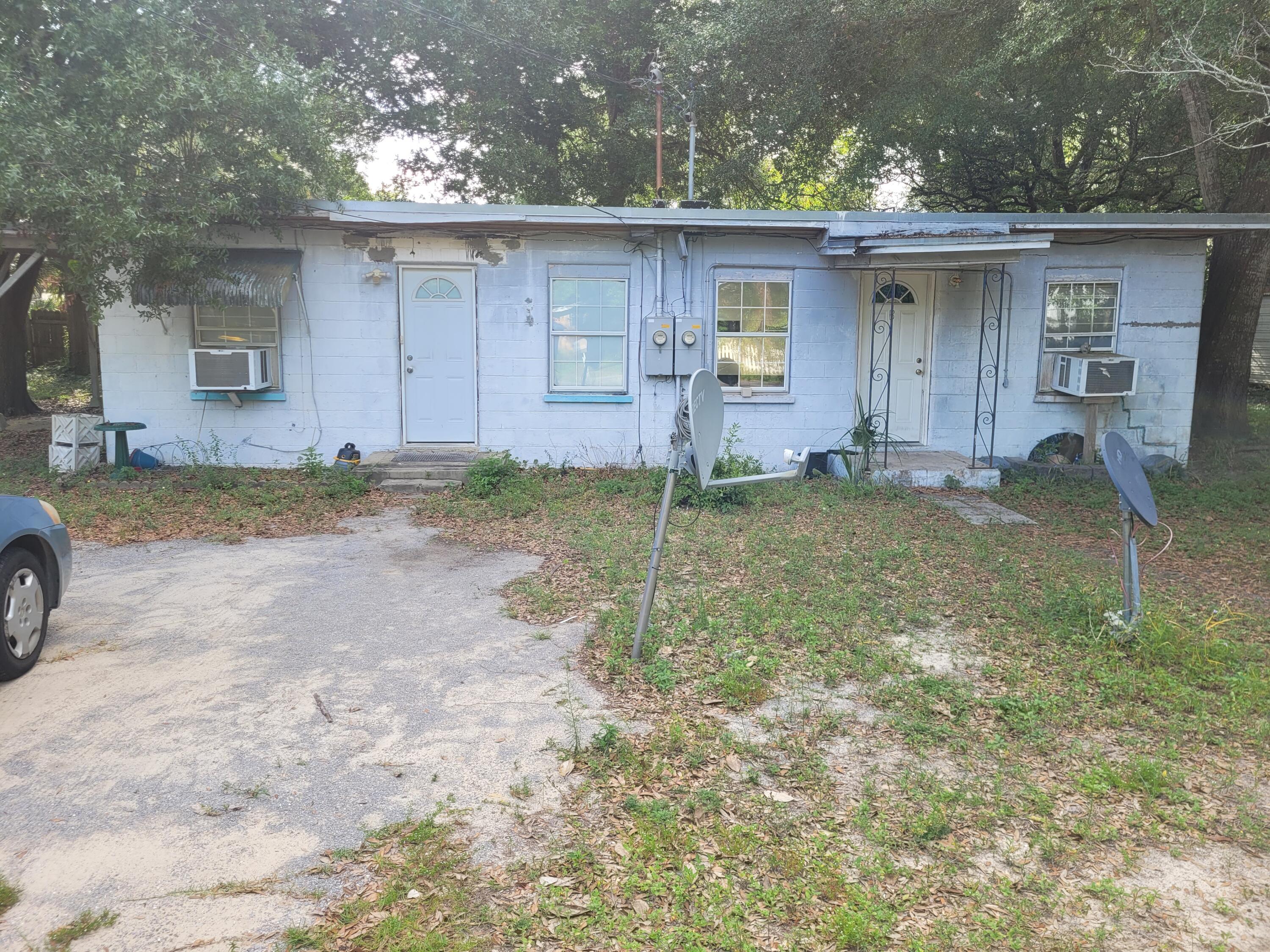 This block duplex will need extensive repairs.  It is however in a great location and holds great promise to the person willing to put the labor and upgrades necessary to bring it back to its potential.  Selling ''As Is'' with no repairs by the Seller.