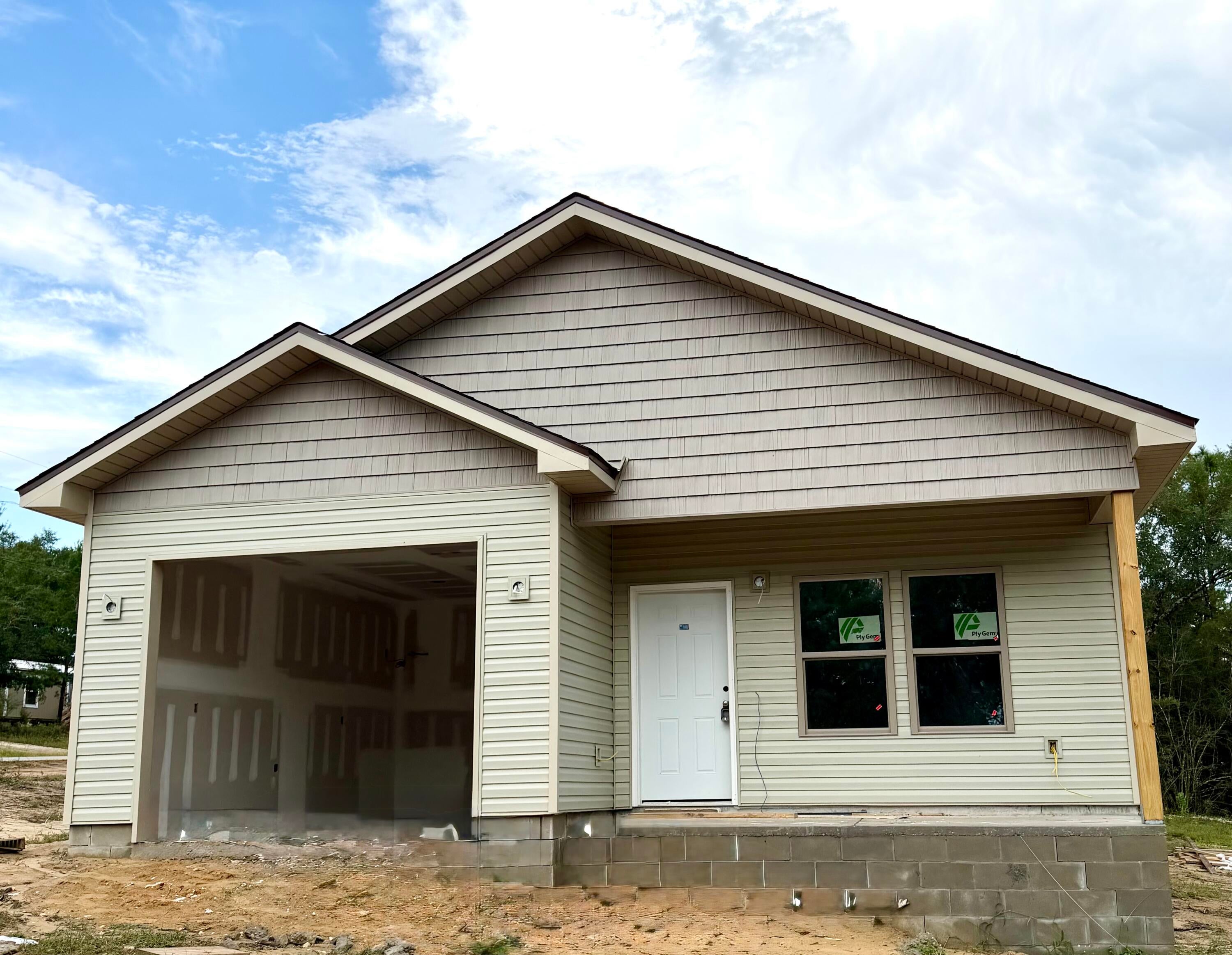 Brand new construction with a custom home feel! Situated on a desirable corner lot, this thoughtfully built home combines upgraded materials, custom finishes, and added privacy. A natural stream area located beyond the property boundary, a spacious corner lot, and a wooded area behind the home create a more private setting with added space between neighboring properties.

Inside, you'll find quartz countertops, custom finishes, stainless steel appliances, and quality construction throughout. The builder has incorporated upgraded materials throughout the home for added quality and durability. Ply Gem vinyl windows with Low E glass provide added energy efficiency and comfort, while sod will be included across the front yard and portions of the side yard.

A builder warranty provides additional peace of mind with your new home purchase. Construction is currently underway with completion projected for the first week of November. Completion timeframe is estimated and subject to change as construction progresses.

From the upgraded materials to the thoughtful finishes and natural setting, this home was designed to offer more than your typical new construction. Enjoy the look and feel of a custom home with the benefits of brand new construction without having to start from the ground up.
