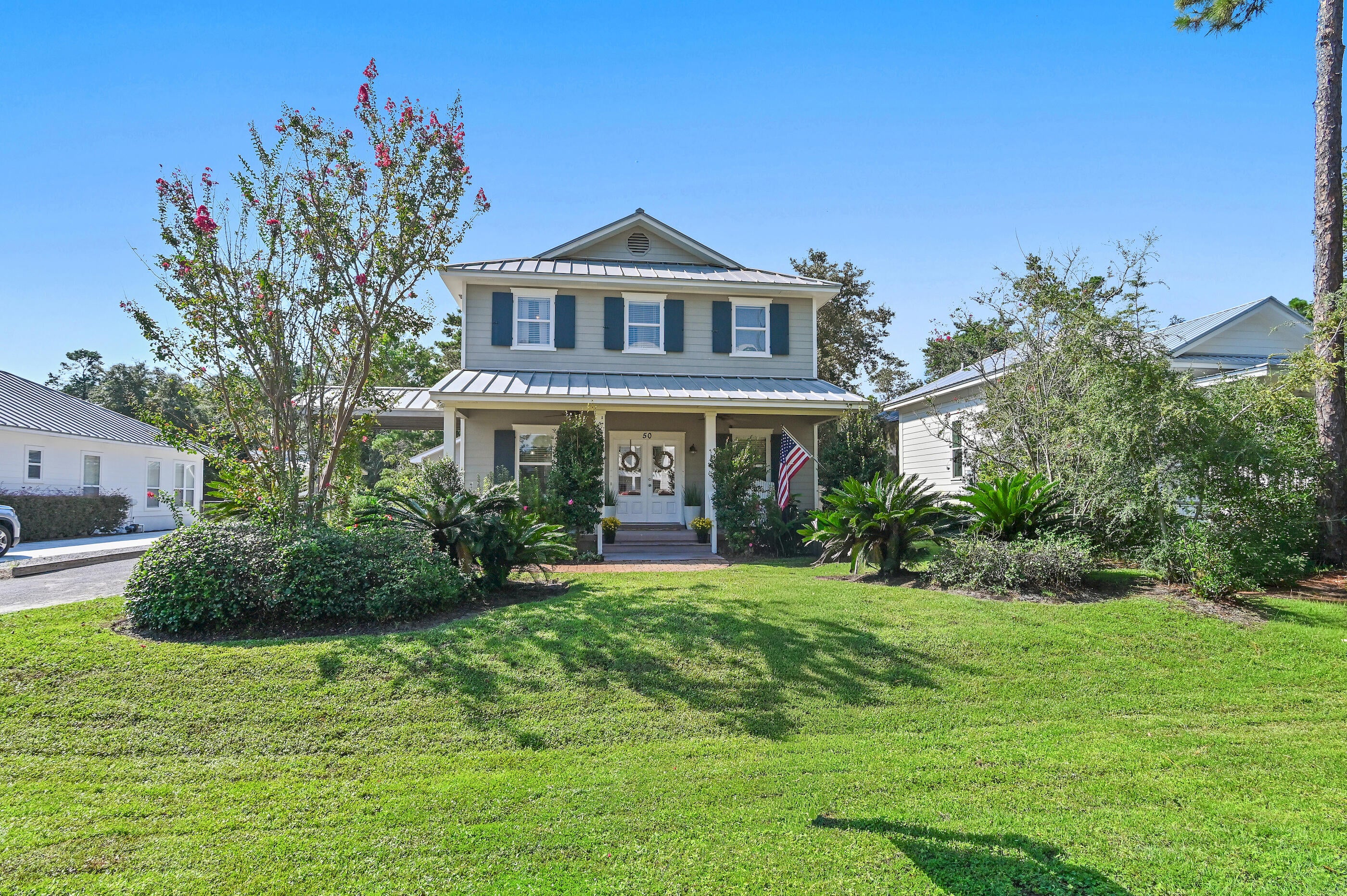 WEST 30A | $850K | NO HOA | SHORT-TERM RENTALS ALLOWED | FLOOD ZONE X | 0.5 MILE TO BEACH ACCESS | DETACHED 2-CAR GARAGE | FENCED BACKYARD | ROOM FOR A POOL

A standout opportunity at 50 Spotted Dolphin Road in Santa Rosa Beach, this 3-bedroom, 3-full-bath single-family home offers 1,736 SF and the flexibility to serve as a primary residence, second home or short-term rental investment.

Located in Hidden Highlands on the desirable west end of Scenic 30A, the home is approximately 0.5 mile from Beach Highland beach access and 0.6 mile from Dune Allen Regional Beach Access, with convenient access to Butler Elementary, Gulf Place, dining, shopping and the 30A bike path.

Inside, the bright, open floor plan provides comfortable gathering space, while spacious bedrooms and three full bathrooms offer flexibility for owners and guests. Outdoor living includes a welcoming front porch, screened back porch and fenced backyard with room for a future pool, subject to applicable permitting and approvals.

Built in 2004 with a seamless metal roof, the property also features a detached 2-car garage offering valuable parking, beach gear storage and additional usable space.

With no HOA fees, short-term rentals allowed, Flood Zone X designation, Gulf proximity, a fenced yard, detached garage and future pool potential, this West 30A property offers a compelling combination of location, flexibility and coastal lifestyle.