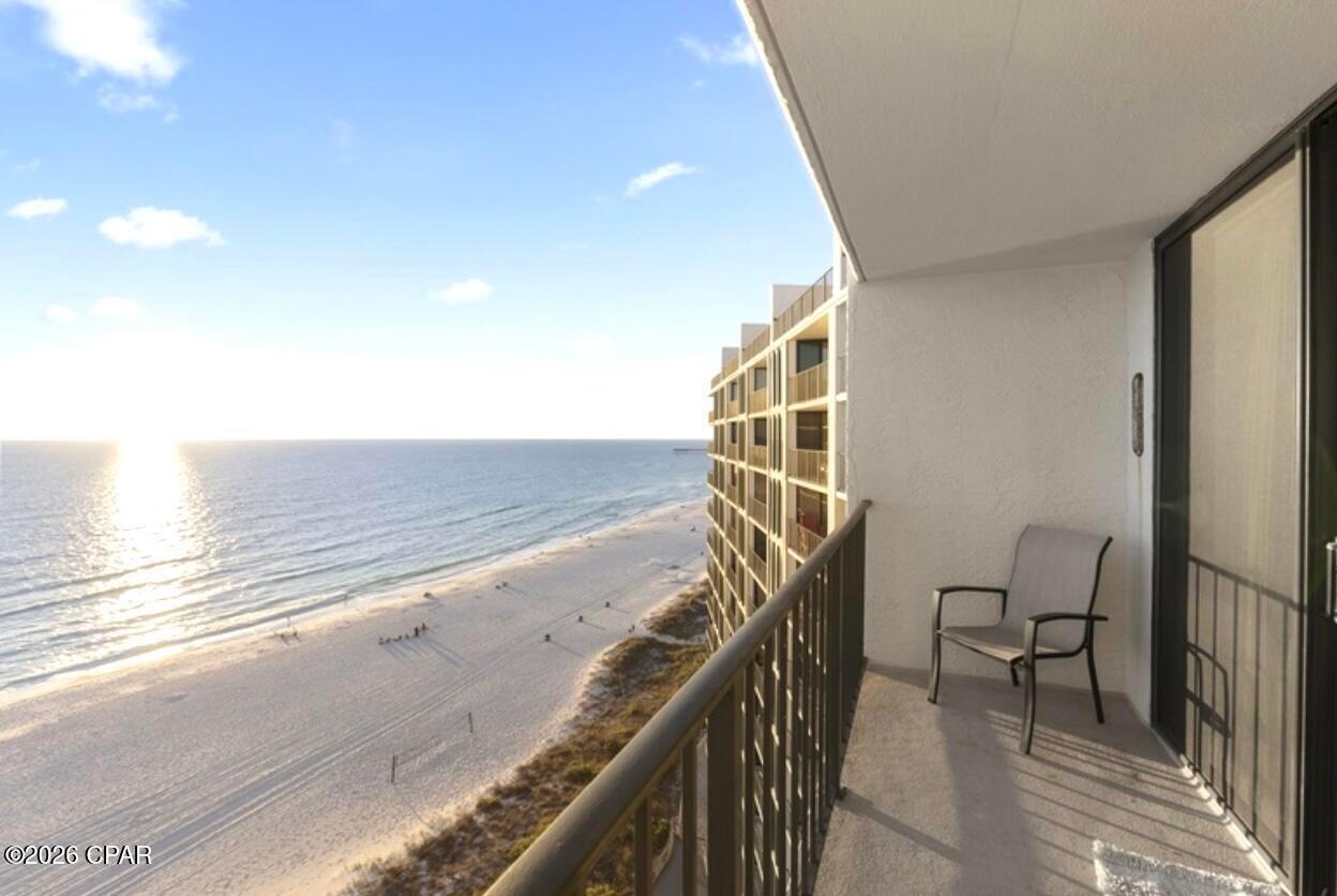 Wake up to sunlit Gulf views and the sound of waves just beyond your balcony in this beachfront condo located within one of Panama City Beach's most sought-after resort communities. Positioned directly on the sand, this residence offers a front-row seat to emerald water, sugar-white beaches, and unforgettable sunsets that make the Emerald Coast famous. Inside, the layout is designed to maximize both comfort and views, creating a spacious coastal retreat ideal for personal getaways or income-producing short-term rentals. Large windows and sliding glass doors bring natural light inside while framing panoramic beach scenery from the living space and private balcony. The resort lifestyle sets this property apart from other units in the building. Owners and guests enjoy access to a vibrant collection of amenities including resort-style pools, beach access just steps away, on-site dining, tennis courts, and activities that keep visitors returning year after year. With short-term rentals permitted, this condo offers flexibility for investors seeking strong vacation rental potential or buyers wanting a private beachfront escape with income opportunities. Whether you're looking for a personal coastal getaway or a property that stands out in the vacation rental market, this beachfront condo delivers the tranquil Gulf-front experience buyers come to Panama City Beach for.