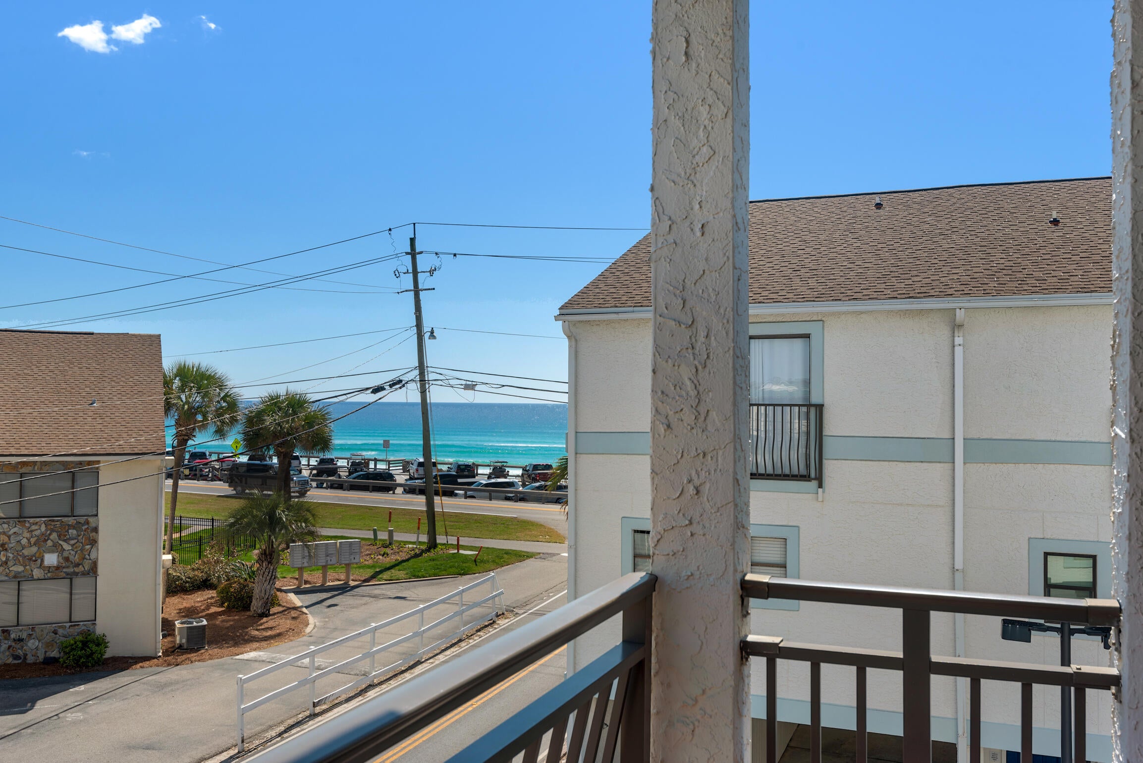 Purchase for only 10% Down! Turnkey Renovated Townhome • Low HOA • 2 Private Balconies • 2 Covered Parking Spaces - Welcome to Costa Vista #9, where coastal elegance meets unbeatable location! Just steps from the beach and directly across from the iconic Pompano Joe's on Scenic Gulf Drive, your DREAM location is here! This fully remodeled, turnkey townhome is the epitome of stylish seaside living, offering Gulf views, two private balconies, two covered parking spaces, and one of the lowest HOA fees in the area.
Spanning nearly 1450 sq feet of thoughtfully designed living space, this two-bedroom, 2.5-bath retreat has been completely updated with premium finishes and coastal-inspired décor. More... The fully renovated kitchen features gleaming granite countertops, storybook-white cabinetry, and sleek stainless steel appliances, ideal for preparing meals in style. Enjoy unobstructed Gulf views from your upper-level balcony, perfect for morning coffee or sunset cocktails. Take the wooden staircase up stairs and retreat to two spacious king suites, each offering its own private ensuite bathroom for ultimate comfort and privacy.

Throughout the home, you'll find chic wood-tile flooring, fresh designer paint, and upscale furnishings that create a refined coastal ambiance.
The spacious living area includes two sleeper sofas, making it easy to accommodate up to 8 guests comfortably.

Step outside to two private balconies - one with Gulf views and the other overlooking the community pool, offering the perfect blend of relaxation and scenery.

Enjoy the convenience of covered drive-through parking for two vehicles, a rare and valuable feature in the heart of Miramar Beach.

A full-size laundry room, half bath, and ample storage space add to the functionality and ease of this well-appointed home.

Take advantage of exclusive access to the community pool, and soak in the Florida sun just steps from your door.

Whether you're spending your day on the beach, dining gulf-front at Pompano Joe's, or exploring the nearby shops and entertainment in Miramar Beach and Destin, you'll be right in the heart of it all.

This stunning home is not only an exceptional personal retreat, but also a proven vacation rental favorite and a rare blend of location, luxury, and investment potential. Qualified buyers can purchase for only 10% down w/ local lender.