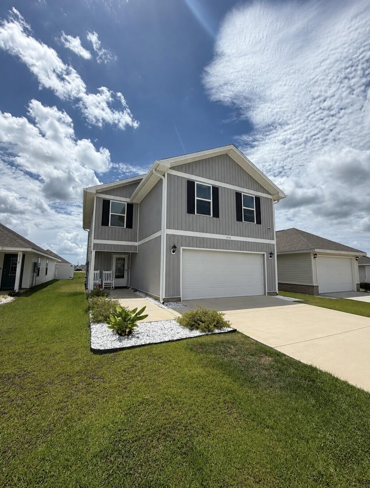Move-In Ready Home in Panama City, FL - Welcome to 6574 Atkins Road!

Discover the perfect blend of comfort, style, and convenience in this beautiful 4-bedroom, 2.5-bath home located in the desirable Liberty community. Offering nearly 2,000 square feet of thoughtfully designed living space, this move-in ready home features an open-concept floor plan ideal for both everyday living and entertaining.

The spacious kitchen includes abundant cabinet space, a large island, and overlooks the dining and living areas, creating a bright and inviting gathering space. Upstairs, the generous primary suite provides a relaxing retreat, while three additional bedrooms offer plenty of room for family, guests, or a home office. A two-car garage, covered patio, and low-maintenance yard add to the home's appeal.

Conveniently located near Tyndall Air Force Base, shopping, restaurants, schools, parks, and medical facilities, you'll also be just a short drive from the white-sand beaches of Panama City Beach. Whether you're a first-time homebuyer, military family, or simply looking for a newer home in a growing community, this property offers exceptional value in an outstanding location.

Don't miss your opportunity to make 6574 Atkins Road your new home. Schedule your private showing today and experience everything this beautiful Panama City property has to offer! 

Buyer to verify all data.