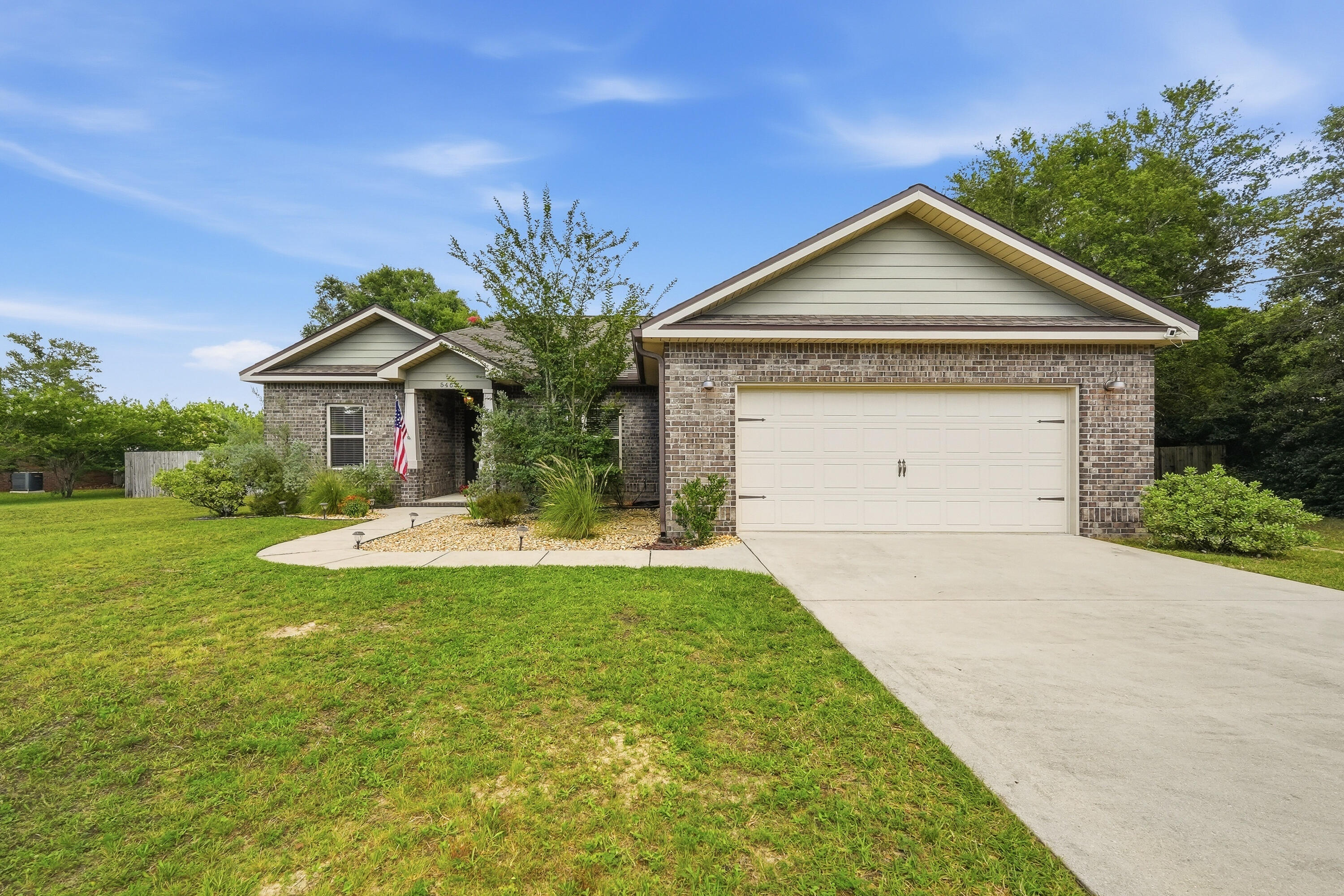 Custom-built by a Parade of Homes-winning builder, this beautifully designed home in Heritage Hills offers the rare combination of quality craftsmanship, modern finishes, and an expansive .62-acre flat lot with no HOA. From the moment you arrive, you'll appreciate the attention to detail and thoughtful upgrades that make this property truly stand out in today's Crestview market.
Inside, you'll find a warm and inviting interior filled with custom touches that many buyers spend years trying to create after moving in. Floating shelves, stained cabinetry, quartz countertops, a striking brick accent wall, and stylish board-and-batten details provide the perfect blend of character and modern design. Every space feels intentional, creating a home that is both functional and visually impressive. 
The living areas flow seamlessly, making everyday living and entertaining effortless. The kitchen serves as a beautiful centerpiece, featuring quality finishes and timeless design elements that complement the home's custom feel.
Step outside and discover one of the property's most impressive features. The rear deck has been expanded to an impressive 25x12 and is enclosed within a screened porch, creating an outdoor retreat designed for year-round enjoyment. Whether you're enjoying a quiet morning, hosting guests, or simply unwinding at the end of the day, this space delivers. Beyond the porch, the fully fenced backyard offers exceptional versatility. The expansive lot provides plenty of room for a future pool, extensive gardening opportunities, outdoor recreation, or additional storage. Need space for a boat, RV, trailer, or recreational equipment? The generous backyard layout makes parking and storage easy.
Located within the established Heritage Hills community, known for its spacious lots and mature surroundings, this property offers the flexibility, privacy, and outdoor space that can be difficult to find. If you've been searching for a move-in-ready home with custom finishes, exceptional outdoor living, and room to grow, this is one you won't want to miss.
Schedule your private showing today and experience everything this remarkable property has to offer.