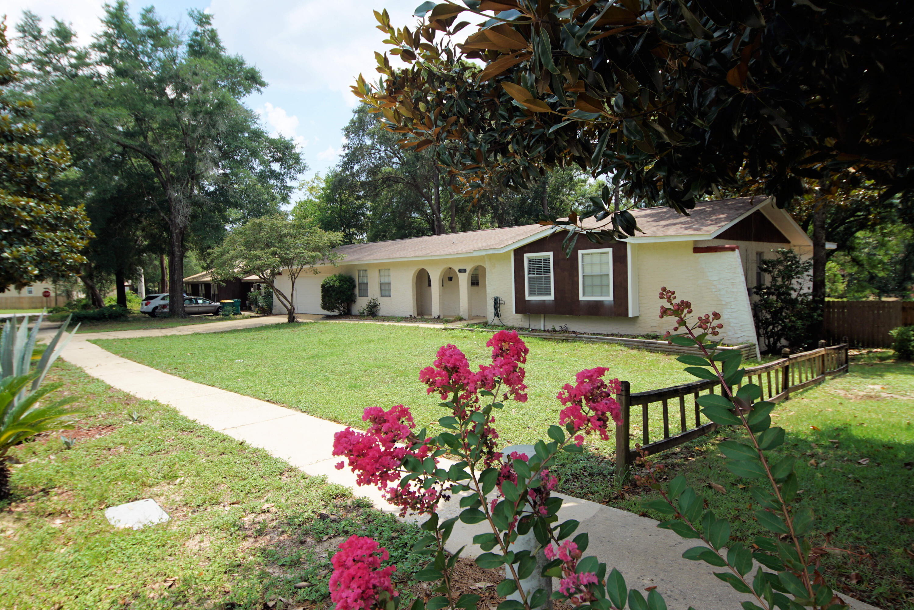 This fantastic Niceville property is now available, conveniently located near schools, shopping, and recreational activities. This rare four-bedroom, two-bathroom home features a large yard overlooking a peaceful lake.
The interior has been updated with neutral paint throughout, featuring wood flooring in the main living areas and tile or vinyl plank in the remaining rooms. The well-appointed kitchen includes stainless steel appliances and offers ample space for both everyday living and entertaining.
A spacious dining room and additional seating area open directly to a large deck, creating a seamless flow for indoor and outdoor living. All bedrooms are conveniently located along a single hallway. The generous primary suite includes an updated ensuite bathroom and an attached office, while while three additional bedrooms share an updated hall bathroom.
Outside, the spacious fenced backyard and wood deck overlook the lake--perfect for hosting guests or relaxing.
This property also features a VA assumable loan at 2.625%.
Updated photos will be uploaded soon
Roof was updated in 2017, HVAC and Water Heater 2025