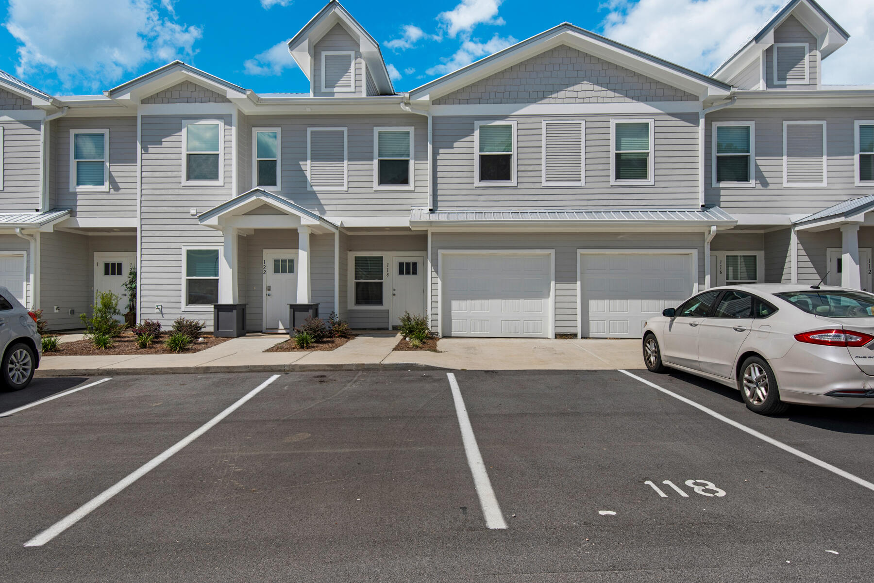 FOR LEASE or LEASE WITH OPTION TO BUY or will SELL with OWNER FINANCING. Conveniently located just 30 minutes from the white sand beaches of 30A and only 40 minutes to Destin! Only minutes from Downtown Freeport. The Verandas offers great amenities such as a pool, pool house, playground and basketball / pickleball courts! Enjoy quiet evenings on your covered patio. This like NEW unit built in 2023 features quartz countertops, stainless steel appliances, plenty of storage, large bedrooms, spacious floor plan, LVP flooring on the 1st floor, washer/dryer hookup and a GARAGE! This Date Palm Ln unit has 2 PARKING SPOTS IN FRONT OF THE UNIT. One is ASSIGNED. Non-smoking. Pets allowed. Trash and lawn care inc. Professionally managed by Owner, NO LEASE FEES, NO HIDDEN FEES, FREE 24 hr maintenance. *Tenant /Buyer to verify all info. *Associate Broker has ownership interest.