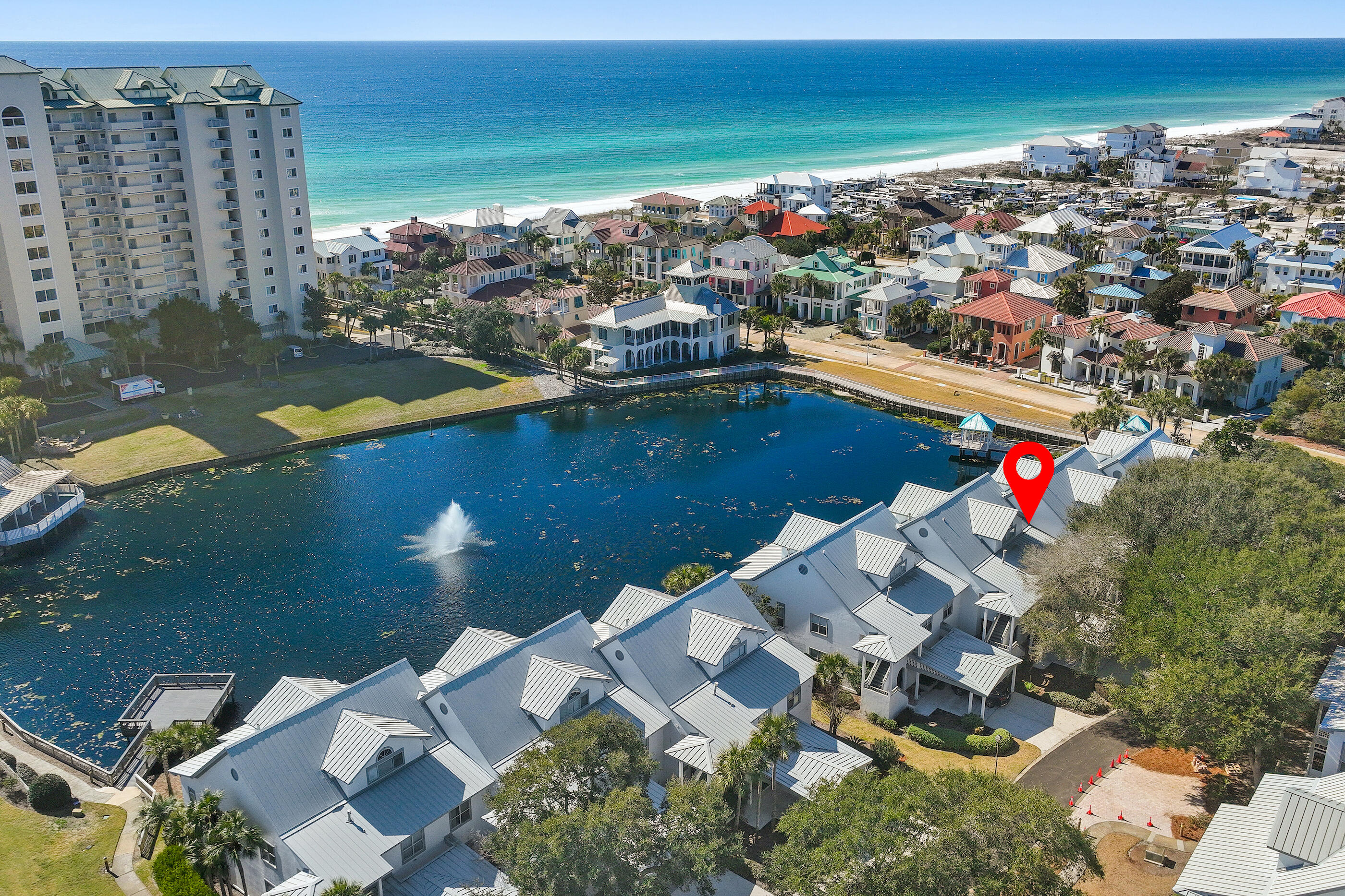 *** GREAT INVESTMENT *** GROUND FLOOR UNIT ON THE LAKE *** BEAUTIFULLY RENOVATED ***   PRIVATE BEACH *** PEEK-A-BOO VIEW OF THE GULF   *** GATED COMMUNITY*** POTENTIAL TO SLEEP 12*** 

Lakefront at Hidden Dunes is a rare find -- Beach Villa 32 delivers Lake ,sunset and fountain views just steps from the private beach.
Beautifully renovated and just a 5-minute stroll to the private beach (no roads to cross). Hidden Dunes Beach and Tennis Resort Villa 32 is a rare 3-bedroom, 3-bath, ground-floor villa with sunset views over the lake and fountain, plus green space just off the wrap-around screened porch. This villa has a private
