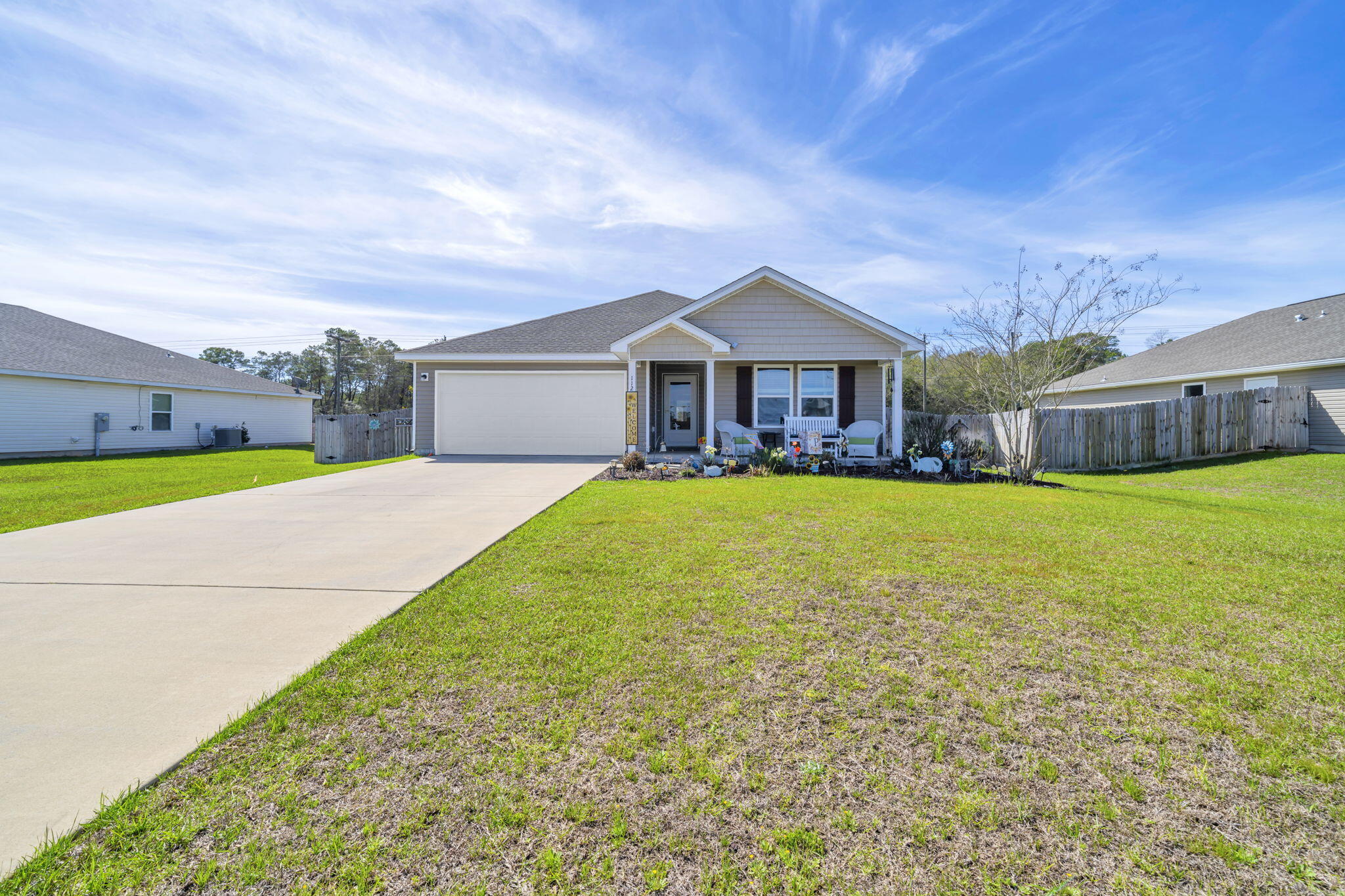 Thoughtfully updated and move-in ready, 112 Mikaela Avenue in DeFuniak Springs offers a comfortable 4 bedroom layout with a versatile bonus room for a home office, study, or homework hub. Main living areas feature durable upgraded vinyl flooring, while practical finishes include custom Levolor blinds, new ceiling fans, and modern bathroom fixtures. The kitchen has an updated faucet and disposal. The fully fenced, landscaped backyard provides private outdoor space for kids and pets and includes a professional sprinkler system for easy maintenance. Mechanical systems are well maintained and dedicated metering supports varied household needs. Located in a friendly small-town neighborhood near parks, schools, shops, and dining, the floor plan balances open living with defined spaces,