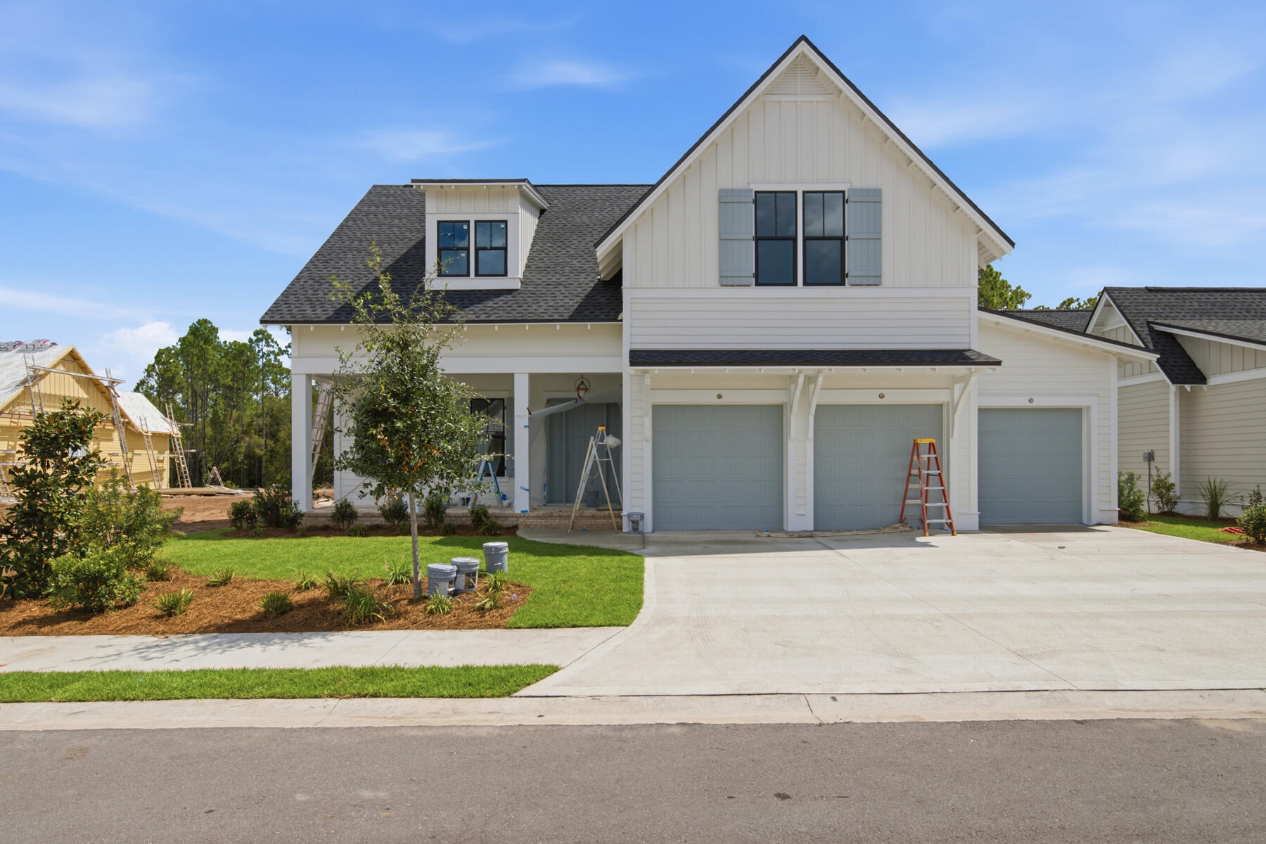 *The new price reflects a builder discount of over $100,000.

Offering over 3,000 square feet of living space, this four-bedroom, four-and-a-half-bath residence with a three-car garage is nestled on a private, wooded home site within the Preserve Collection at Arborview Park in Watersound Origins. Estimated completion: August 2026. 
The home blends refined architectural details, premium finishes, and exceptional indoor-outdoor living.

he foyer opens into an expansive main living area where engineered hardwood flooring, 10-foot ceilings, and bronze 16-foot sliding glass doors create a seamless connection between the great room, dining area, and screened outdoor living space. A 42-inch gas fireplace with a Dekton surround and shiplap accent wall anchors the living room, while natural light fills the open floor plan.

The kitchen features stacked glass cabinetry, a large walk-in pantry, and premium Premata stone countertops with mitered edges and a matching full-height backsplash. The professional appliance package includes a paneled 36-inch Sub-Zero refrigerator, 36-inch Wolf dual-fuel range with custom wood vent hood, Wolf microwave drawer, and Cove dishwasher. A nearby dry bar is equally impressive with stacked glass cabinetry, a paneled Sub-Zero beverage refrigerator, and a Scotsman nugget ice maker.

Privately tucked away on the first floor, the primary suite offers direct access to the screened porch through glass French doors, creating a peaceful connection to the outdoor living spaces. The spa-inspired bath features dual vanities with upgraded Premata stone countertops, a freestanding soaking tub, spacious walk-in shower with marble tile flooring, separate water closet, and an expansive walk-in closet with custom MDF shelving. An additional storage room tucked beneath the staircase is conveniently accessed through the primary closet.

A secondary bedroom with an ensuite bath and walk-in closet is also located on the first floor, providing flexibility for guests or multi-generational living.

Upstairs, a spacious sitting room creates an additional gathering space between two private guest suites. Bedroom three includes an ensuite bath, generous closet, and a cozy nook ideal for reading or quiet relaxation, while bedroom four features an ensuite bath with dual vanities and an oversized L-shaped walk-in closet.

The outdoor living spaces are equally inviting. The 26-by-13.5-foot screened porch showcases brick flooring, a shiplap ceiling, two ceiling fans, and a 42-inch ventless gas fireplace with a weathered barnwood mantel. Just beyond, the saltwater pool and spa are complemented by upgraded tile, premium plaster finishes, generous decking, and a fully equipped outdoor kitchen featuring an Alfresco grill, vent hood, granite countertops, and NatureKast cabinetry. Privacy fencing and the oversized wooded homesite create an exceptional backdrop for outdoor enjoyment.

Additional highlights include a three-car garage with epoxy flooring, acrylic utility sink, and side-yard access, 1¾-inch solid wood shaker interior doors, crown molding throughout the main living areas, impact-rated bronze windows and doors, two dehumidifiers, tankless gas water heater, pre-plumbing for a water softener, and generator pre-wire with installed gas line.

Located within the Preserve Collection at Arborview Park, residents enjoy larger homesites, access to the Origins Golf Course, Village Commons, miles of walking and biking trails, and all of the amenities that make Watersound Origins one of Northwest Florida's premier communities.

Pricing subject to change as the home progresses and selections are added or removed.