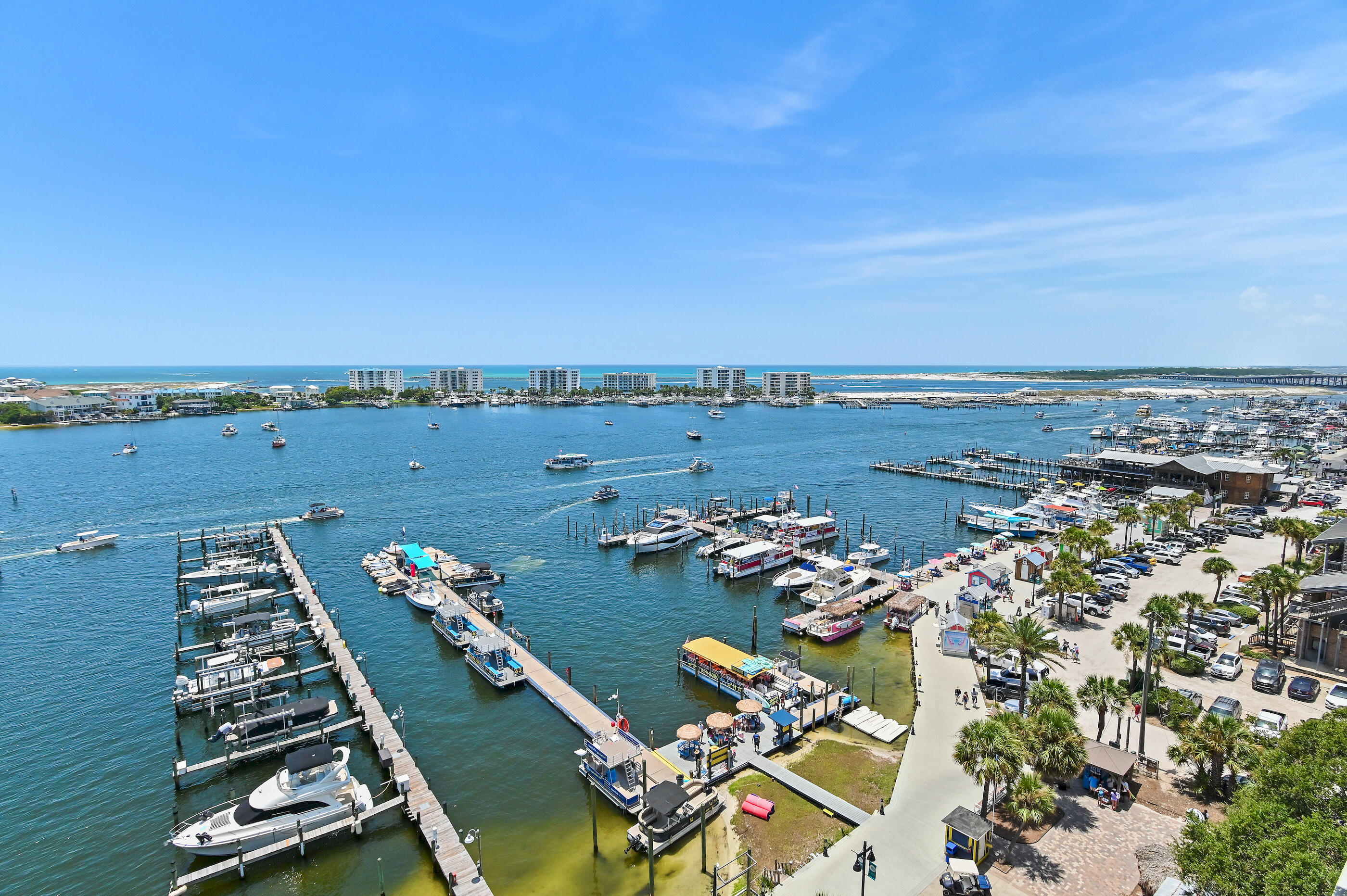 Some places are unforgettable.  
Occupying the corner unit on DYCs 9th floor, this extraordinary 2 bedroom 3 bath residence commands what is arguably one of the finest views on the Emerald Coast. Suspended between the Destin Harbor, East Pass and Gulf, the home feels as though it rests on its own private island. From first light dancing on the harbor to spectacular sunsets melting into the gulf, every room celebrates the beauty that has made Destin one of the country's most treasured destinations. This is more than a home...it's a front row seat to everything that makes Destin extraordinary.
DYC is a non rental building 
Unit comes with slip 19 on the east dock with a 2019 23´ Bennington SX pontoon and a lift.