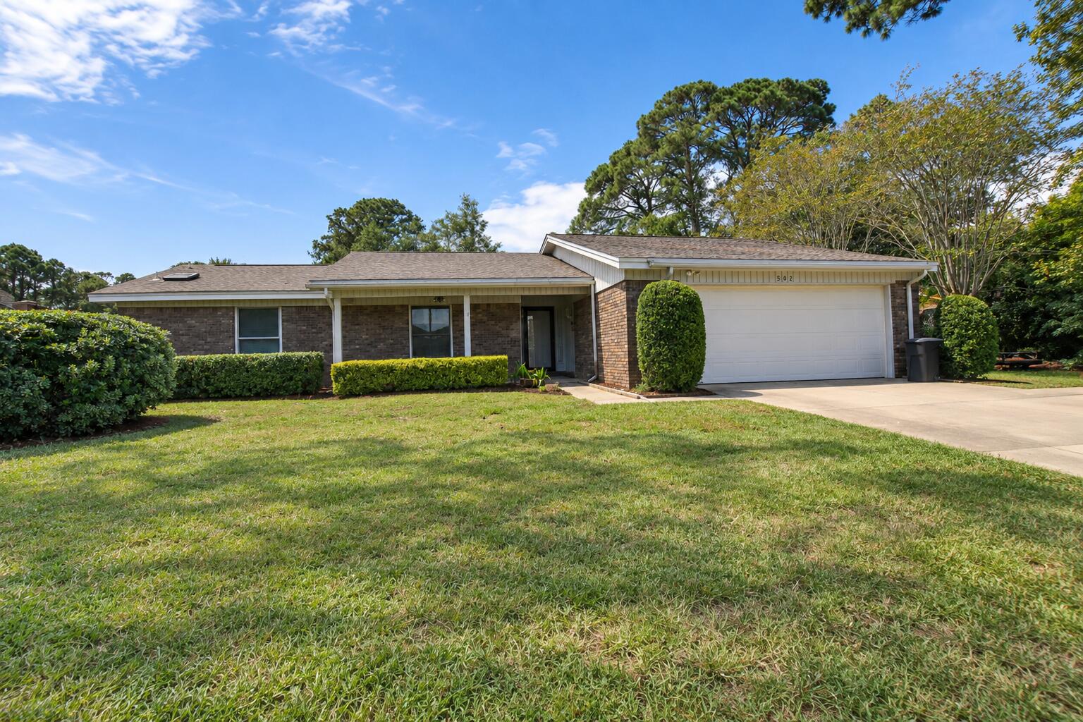 Welcome to 502 Sequoia Dr, Fort Walton Beach, FL! This 3-bedroom, 2-bath home offering 1,662 square feet combines a spacious floor plan with distinctive character and plenty of potential to make it your own.
The heart of the home is the large living room, highlighted by a dramatic vaulted wood ceiling with exposed beams and a brick fireplace, creating a warm and inviting focal point. Generously sized windows provide natural light throughout the home, while the adjoining dining area offers an easy flow for everyday living and entertaining.
The kitchen provides abundant cabinetry and counter space, while the primary bedroom features a private en-suite bath with a double vanity. Two additional bedrooms offer flexibility for family, guests, a home office, or hobbies.
Outside, enjoy a spacious yard with mature trees and established landscaping, providing plenty of room for outdoor living, gardening, or recreation. An attached two-car garage adds valuable parking and storage space.
Conveniently located in Fort Walton Beach, this home is ready for its next owner to bring their personal style and vision. With 1,662 square feet, three bedrooms, two baths, a two-car garage, vaulted architectural details, and a spacious lot, 502 Sequoia Dr offers an excellent opportunity to create a home that's truly your own.