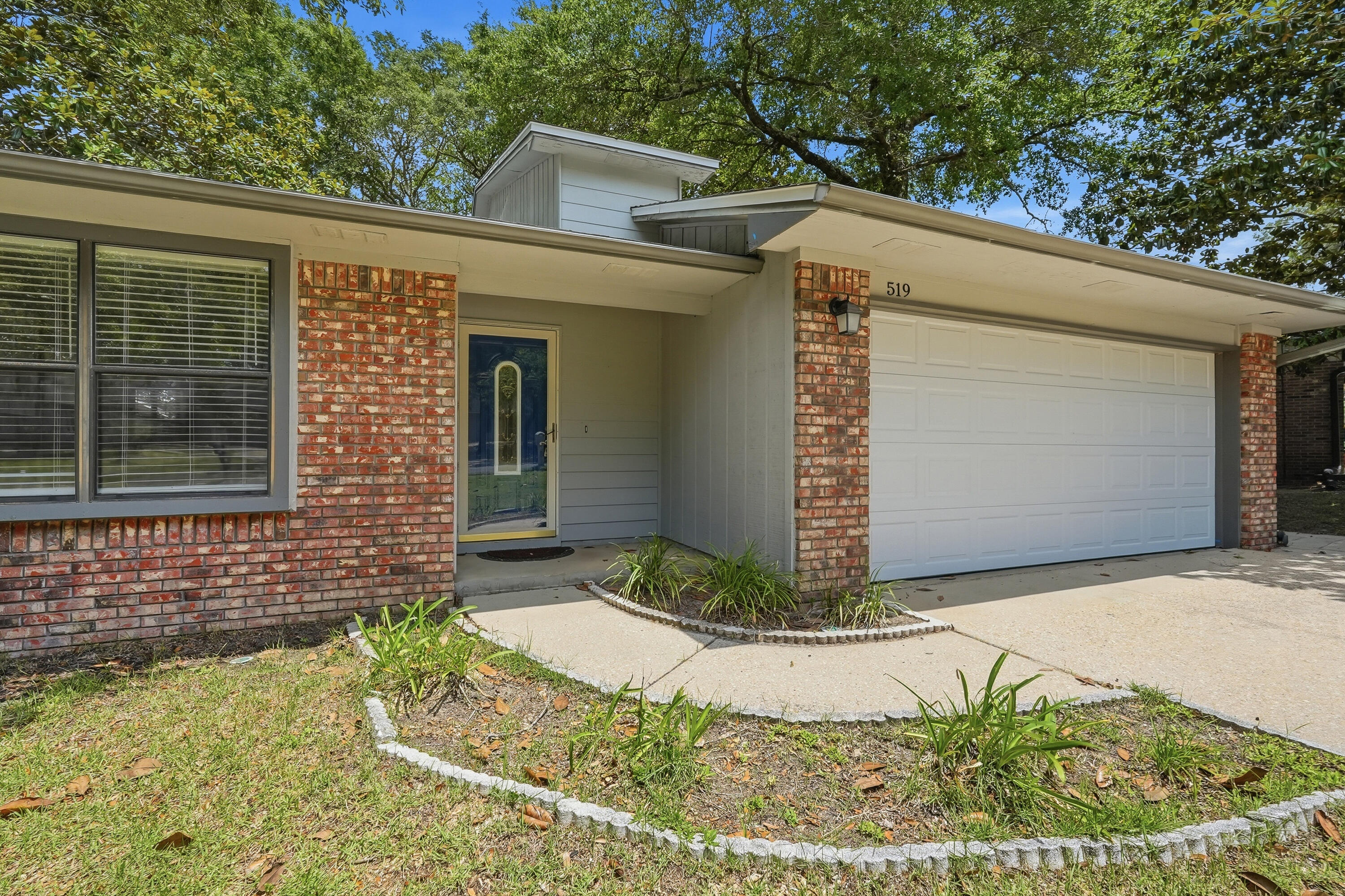 Welcome to this beautifully maintained 3-bedroom, 2.5-bath home located in the heart of Niceville! This inviting home features a spacious eat-in kitchen with durable tile flooring, offering both style and easy maintenance.

The living room boasts hardwood flooring, a cozy corner gas fireplace, and direct access to a back deck overlooking the fully fenced backyard, perfect for relaxing or entertaining. The generously sized main-floor primary suite is downstairs situated at the front of the house, filled with natural light and provides ample space for larger furnishings. The en-suite bathroom features a separate vanity area and custom tile surrounding the tub/shower combination.

There is also a convenient large under the stair's storage room and upstairs, you'll find two comfortable, carpeted bedrooms. Each room has its own private balcony overlooking the backyard, as well as a full guest bathroom with a shower/tub combo.

Additional features include a two-car garage and a fantastic central Niceville location close to schools, shopping, dining, Eglin AFB, and the Emerald Coast's beautiful beaches. Contact us today to schedule a showing!