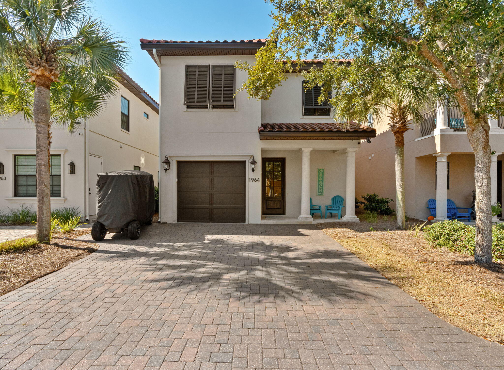 **FURNISHED**GARAGE** **(2) 6 PASSENGER GOLF CARTS INCLUDED** **BRAND NEW A/C UNITS 2026** Welcome to 1964 Baytowne Loop, a rare opportunity to own a 4-bedroom, 4-bathroom home designed for comfort, flexibility, and effortless ownership. The open-concept floor plan is highlighted by hardwood flooring, granite countertops, and KitchenAid appliances, creating a clean, timeless coastal aesthetic. A main-level bedroom adds everyday convenience, while the remaining bedrooms offer privacy and space for family and guests. The living spaces flow seamlessly into a screened-in patio, creating a private outdoor retreat ideal for morning coffee, evening cocktails, or unwinding after a day at the beach. The attached garage provides valuable storage--perfect for beach gear, bikes, owner belongings, or golf cart storage. What truly makes this home special is its location inside Sandestin Golf & Beach Resort. You're wrapped in 2,400 acres of 4-championship golf courses, a full serve marina, tennis center, miles of walking and biking trails, dining, shopping, and the freedom of golf-cart living.