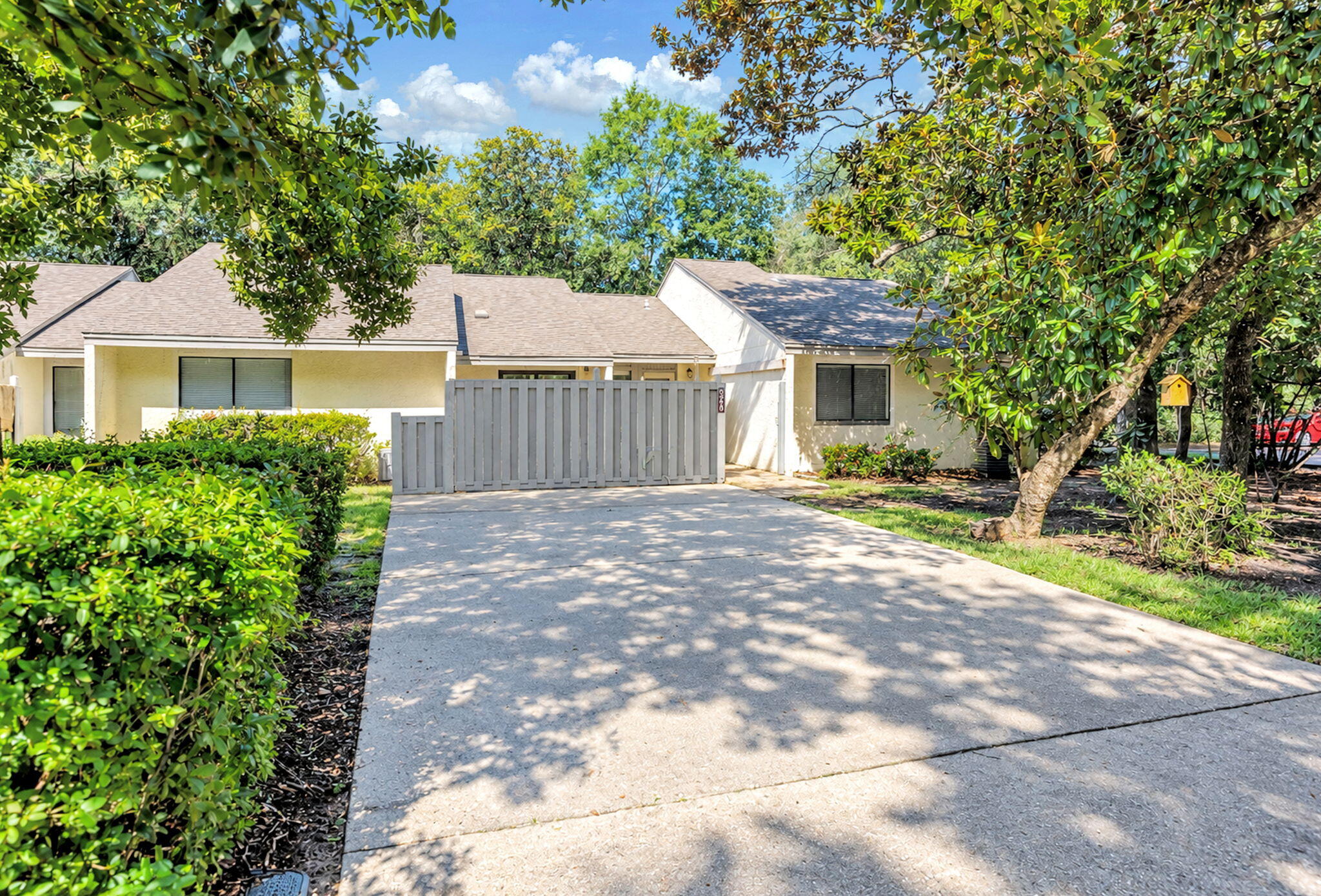 Affordable, Easy, Low-Maintenance living in the heart of Bluewater Bay! This beautifully maintained one-story, 1,422 sq ft, End-Unit Patio Home offers 2 bedrooms, 2 bathrooms, a flexible bonus space, private courtyard, & backyard- all in a desirable master-planned community known for its exceptional lifestyle & amenities. Inside, the open-concept living & dining areas feature beautiful wood flooring & flow into a versatile bonus space ideal for a home office, hobby room, reading area, or possibly an additional 3rd Bedroom conversion. The well-sized kitchen offers ample cabinet storage, space for casual dining, new refrigerator (2025), & sliding glass doors opening to a charming private paver courtyard. Whether you're enjoying your morning coffee, tending a few garden plants, or gathering with friends, this outdoor space adds another layer of livability & charm. Both bedrooms feature spacious layouts, with walk-in closets. The primary suite includes an en-suite bathroom, with oversized vanity, & Shower with grab bar entry. private access to the paved patio and backyard. A dedicated laundry room with washer and dryer adds convenience. Enjoy the benefits of low-maintenance ownership, with the HOA covering exterior landscaping, siding, and roof. The roof is approximately 8-10 years old, and the HVAC was replaced in 2022. As an end unit, this home offers added privacy and a wonderful outdoor setting tucked in amongst beautiful mature trees & greenery.
(READ MORE) Bluewater Bay places recreation & relaxation just minutes from your door. The Bluewater Bay Marina Complex is approximately 0.8 miles away & offers boat slips, storage, fuel, ship supplies, & waterfront dining at local favorite LJ Schooners Restaurant & Oyster Bar - a wonderful place to gather with friends, enjoy a meal, & watch the sunset over the water. The community pool is approximately 0.4 miles away, while the Bluewater Bay Tennis & Pickleball Center is approximately 0.6 miles away & features lit clay courts & a full-service clubhouse.

Golf enthusiasts will love being approximately 1 mile from Bluewater Bay Golf Club, featuring 18 holes of championship golf designed by Tom Fazio & Jerry Pate. The community also offers disc golf, walking paths, tree-lined streets, & two parks with playgrounds. You are also an easy, appropriately 10 miles, from the World Famous White Sand Beaches & the sparkling Emerald Green Waters of the Gulf!

Whether you're looking for a full-time residence, second home, or an easy-care coastal lifestyle, this Bluewater Bay patio home offers the opportunity to spend more time enjoying where you live! Call Your Realtor today to schedule a Tour!