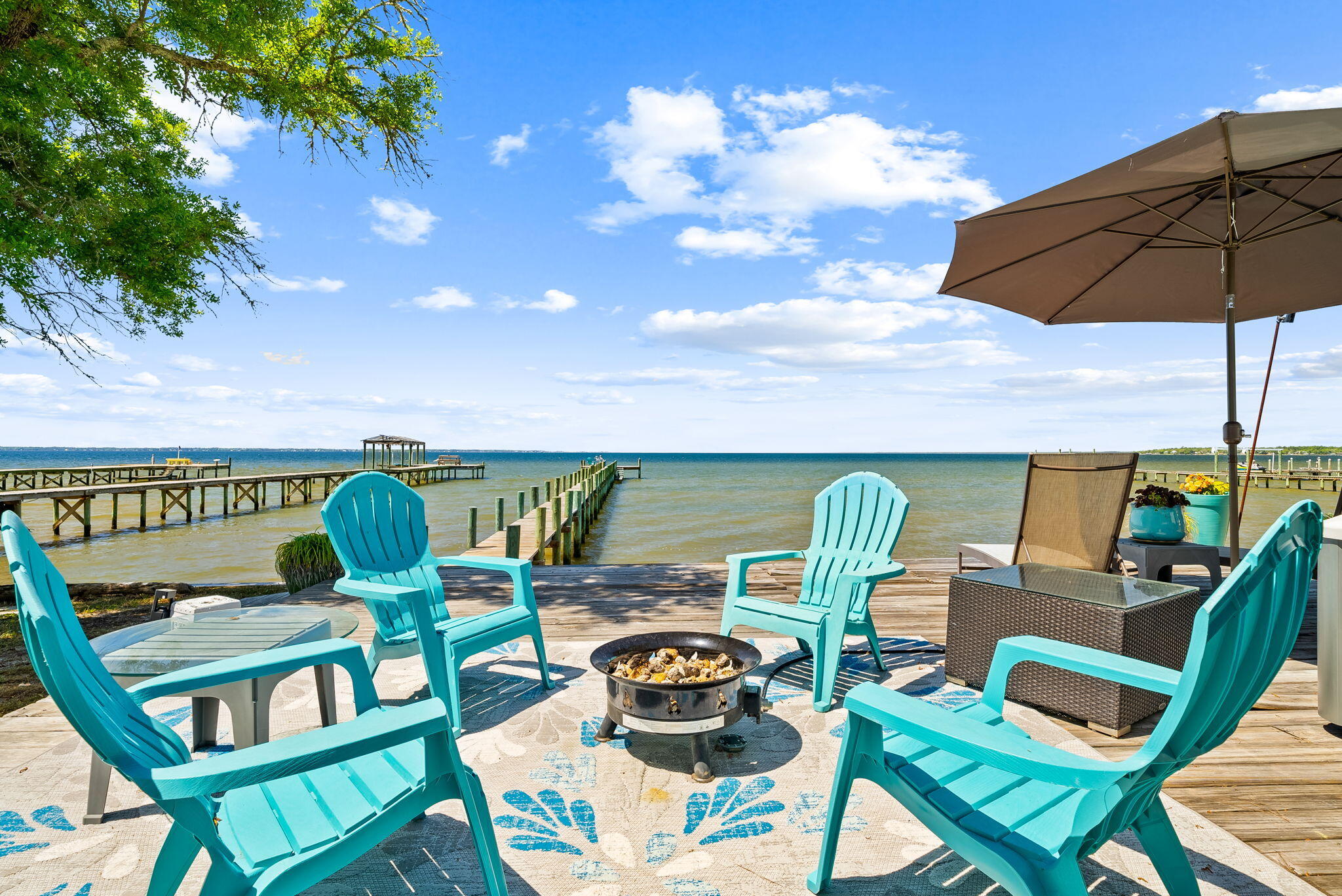 Under contract with 72 Hour Kickout Clause. 
Discover waterfront living in Freeport, where peaceful bayfront views, a new dock, and no HOA create the ideal coastal retreat. This charming 2-bedroom, 2-bathroom home offers 60 feet of bay frontage, giving you direct access to the water and the relaxed lifestyle buyers are searching for along the Emerald Coast.
Inside, the home features 10-foot ceilings and an open floor plan that showcases breathtaking bay views. The light-filled living spaces are designed for comfort and easy entertaining, blending indoor and outdoor living.
A new roof installed in 2024 adds peace of mind, while the prime location places you just minutes from 30A beaches, shopping, dining, and everyday conveniences. Whether you're looking for a primary residence, vacation getaway, or waterfront rental opportunity, this Freeport bayfront property offers a rare combination of privacy, accessibility, and coastal charm.
Enjoy the best of waterfront living in Freeport with no HOA restrictions, a new dock, and direct bay access in one of the area's most desirable locations.