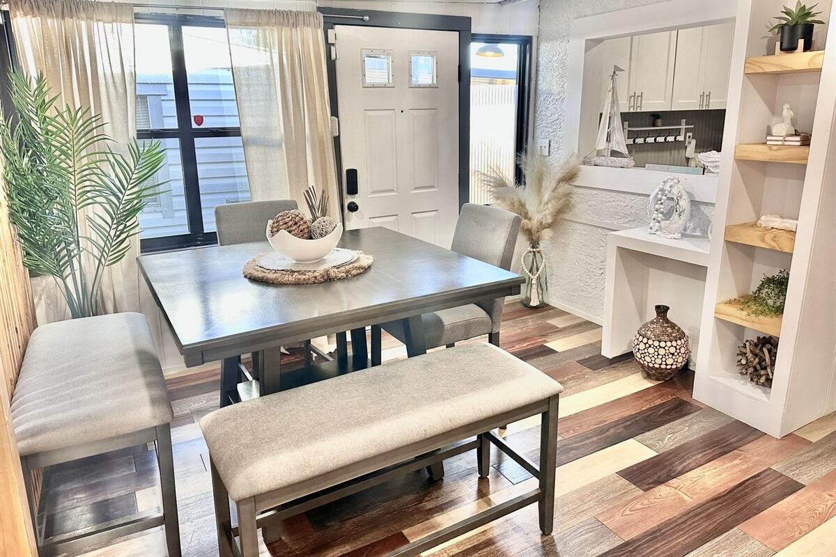 Welcome to 309 Jasmine Place--your fully renovated coastal retreat in the highly sought-after Laguna Beach area of Panama City Beach. This charming 3-bedroom, 2-bath Florida cottage offers the perfect blend of modern upgrades and laid-back beach living, just an easy 8-minute walk to the sugar-white sands of the beach. Completely transformed from top to bottom, the interior showcases stylish LVP flooring throughout, all-new cabinetry, updated appliances, and thoughtfully selected furnishings that create a bright, coastal-inspired atmosphere. A new roof installed in 2023 adds peace of mind, making this home as practical as it is beautiful.Whether you're searching for a primary residence, vacation getaway, or a high-performing short-term rental investment, this property checks every box.