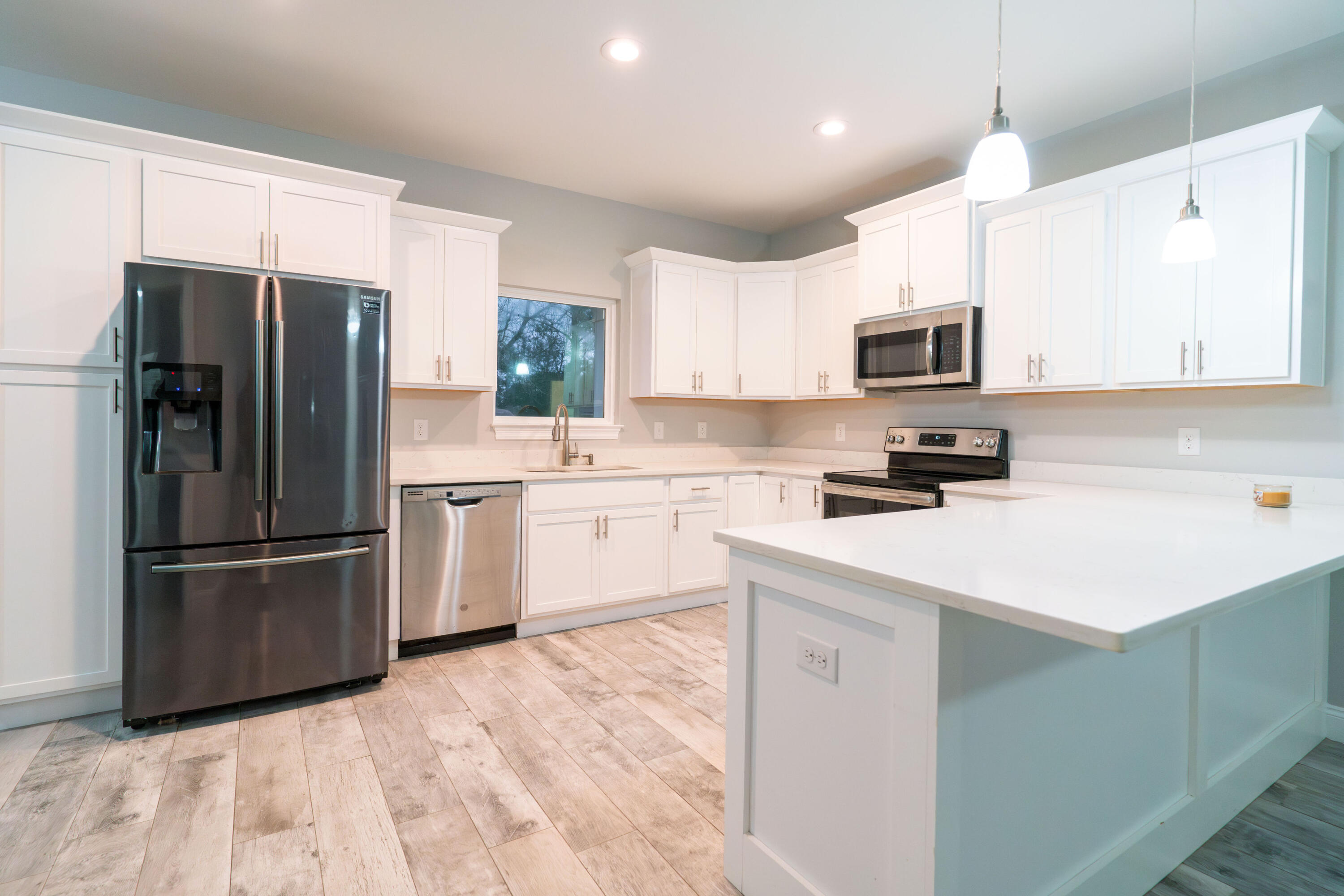Let me paint a vivid picture of why you'll fall head over heels for this craftsman-style home in Navarre. As soon as you go inside, you'll be greeted by the inviting open concept layout, creating a warm and welcoming atmosphere for you and your loved ones. The new flooring throughout adds a touch of elegance, making the space feel fresh and modern. Now, let's talk about the kitchen - it's a true showstopper! With stunning quartz countertops, it's not just a place to cook, but a haven for culinary creativity. And with 3 bedrooms and 2 full bathrooms, there's plenty of room for your family and guests to feel comfortable. The master bedroom offers a spacious walk-in closet, providing ample storage space for all your belongings. Trust me, this home is a true gem that you'll want to call your