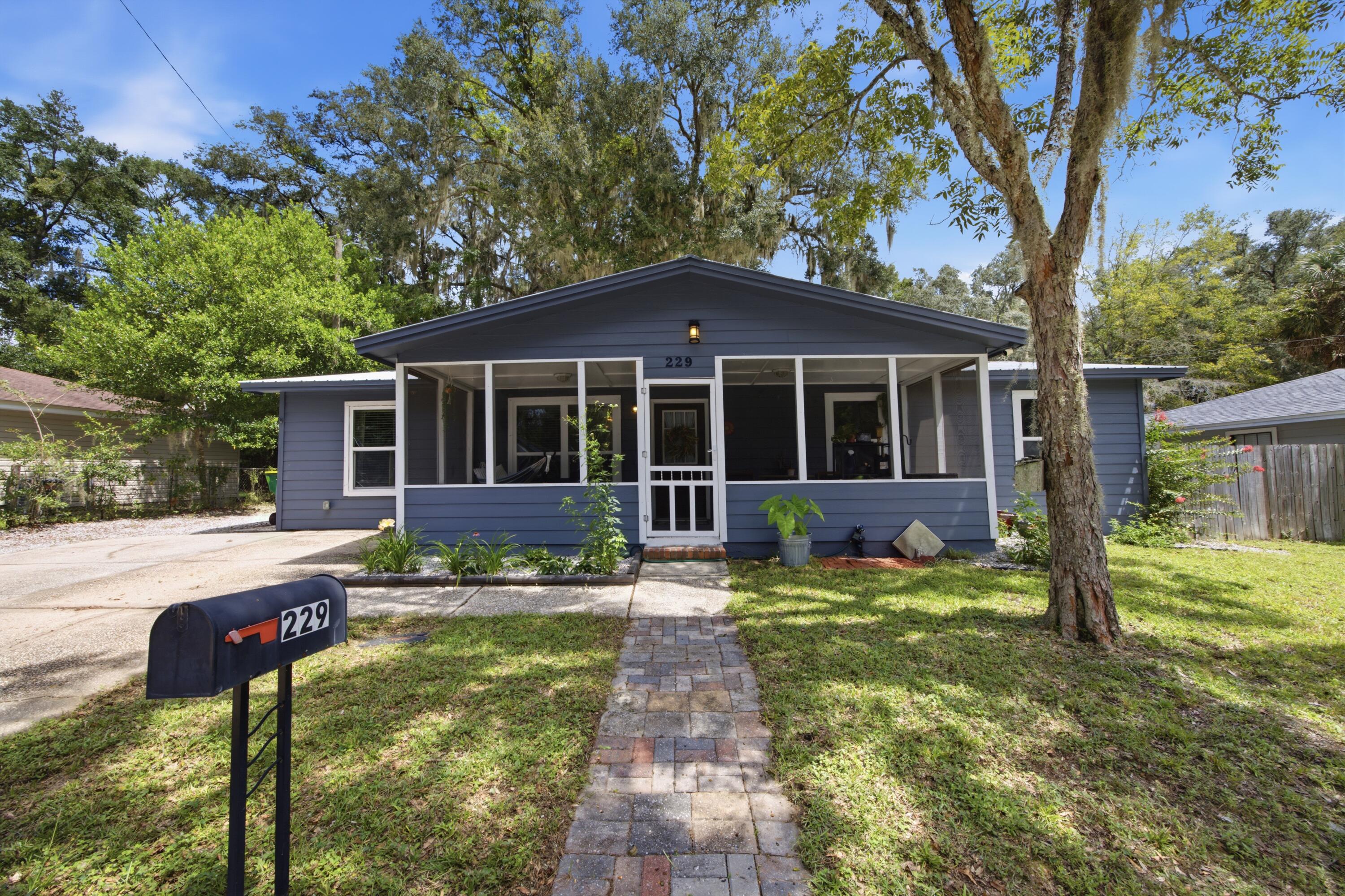 Featuring vibrant character, a screened-in front porch, and a private outdoor haven, this home is packed with personality! Welcome to 229 Palmetto Avenue in Niceville, a bright 3-bedroom, 1-bathroom home designed for relaxed Florida living. Ideally situated for military personnel, this location offers an effortless commute, sitting just under 7 miles from Eglin Air Force Base. Start your morning on the screened-in front porch before stepping inside to a light-filled, colorful layout. The comfortable living space flows into a functional kitchen and dining area, while three versatile bedrooms provide ample space for family, guests, or a home office. The star of the home is the fully fenced backyard oasis; a lush, private retreat built for weekend barbecues, relaxing, and outdoor entertaining. Located minutes from Boggy Bayou water access, this unique home offers the perfect blend of charm and convenience. Bring all offers today!