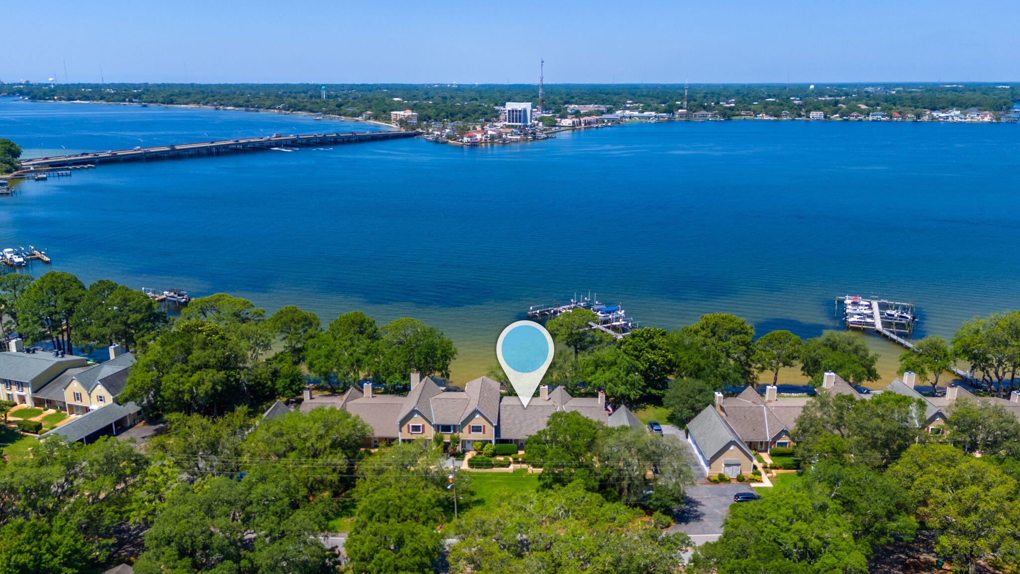 Experience waterfront living at its finest in this beautifully renovated 2-bedroom, 2-bathroom townhouse nestled in the heart of Shalimar. Offering breathtaking water views and modern upgrades throughout, this exceptional home combines coastal charm with contemporary comfort.

Step inside to discover luxury vinyl plank flooring flowing throughout the living spaces, creating a stylish and low-maintenance environment. The stunning kitchen is truly the centerpiece of the home, featuring elegant quartz countertops, a fully tiled backsplash, stainless steel appliances and a striking stainless-steel Belfast sink. Designed with both functionality and style in mind, this inviting space is perfect for everyday living and entertaining alike.

The spacious primary suite provides a private retreat, complete with an en-suite bathroom featuring a walk-in shower, separate soaking tub, and ample space to unwind after a long day. A second generously sized bedroom and full bathroom offer comfort and flexibility.

Step outside and enjoy the true highlight of this property--spectacular waterfront views from your private outdoor deck. Whether you're sipping your morning coffee, entertaining friends, or simply relaxing while watching the sunset, this outdoor space offers the perfect backdrop for coastal living.

Conveniently located near local dining, shopping, military bases, and the beautiful Emerald Coast beaches, this townhouse offers the ideal blend of location, lifestyle, and luxury.

Don't miss your opportunity to call this exceptional waterfront property home. Pets considered with application. Contact us today to schedule a showing!