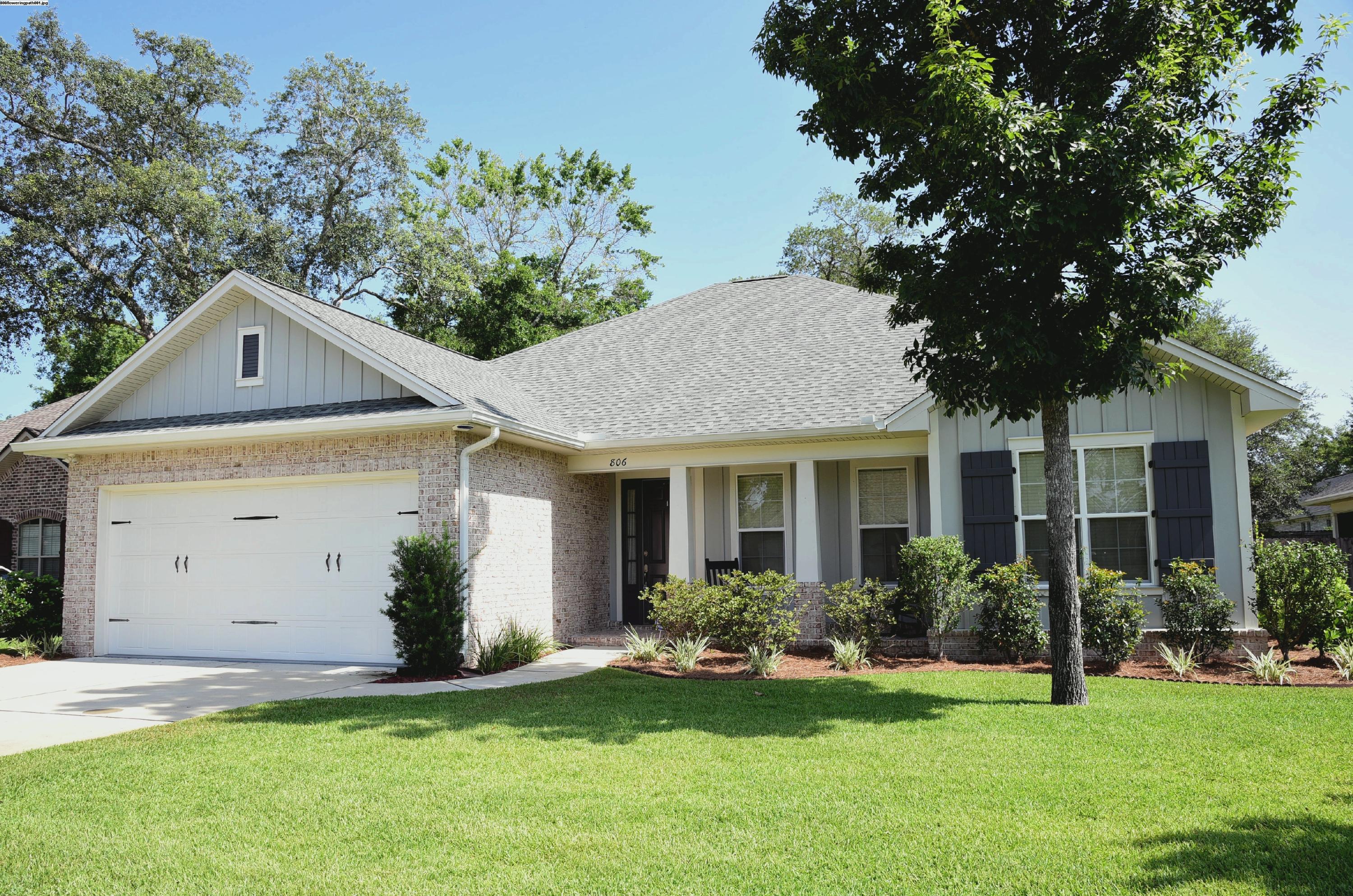 Welcome to this beautifully appointed 4-bedroom, 2-bathroom home featuring an open floor plan and an impressive selection of high-end finishes. The main living areas showcase a combination of wood and tile flooring, complemented by elegant crown molding throughout.

The spacious eat-in kitchen is designed for both everyday living and entertaining, featuring stainless steel appliances, a gas stove, breakfast bar, and plenty of workspace. The kitchen flows seamlessly into the living area, where a fireplace creates a warm and inviting gathering space.

The primary suite offers a private retreat with an en-suite bathroom featuring a walk-in closet and a convenient walk-in shower. Three additional bedrooms share a full bathroom, providing plenty of space for family, guests, or a home office. A dedicated laundry room with washer and dryer hookups adds everyday convenience.

Enjoy outdoor living from the screened porch, which overlooks the large, fully fenced backyard--perfect for relaxing, entertaining, or enjoying time outdoors. This home combines stylish finishes, functional living spaces, and comfortable indoor-outdoor living. Pets considered with application. Contact us today for a showing!