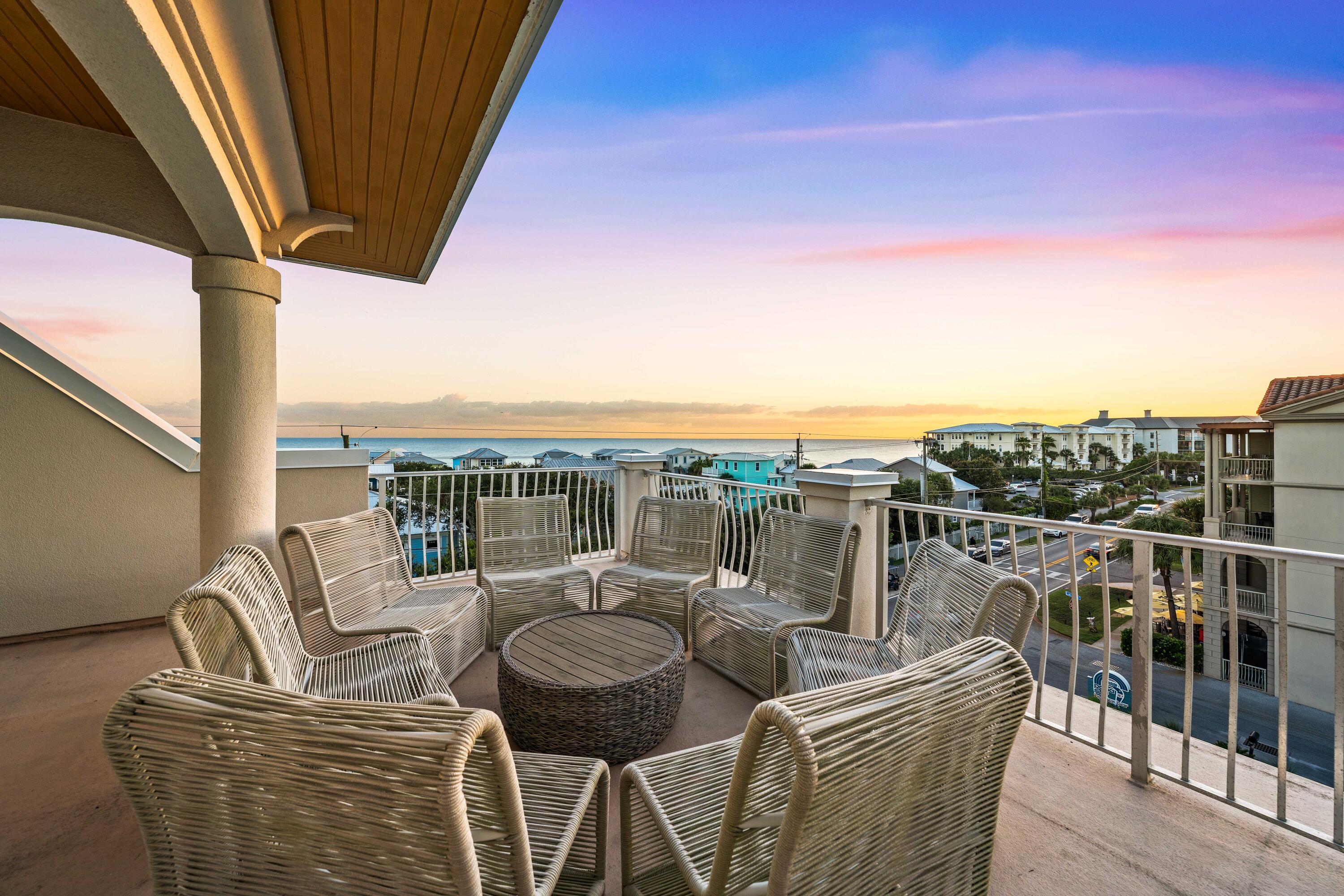 Panoramic Gulf views from the rooftop deck, a strong rental history, and three nearby public beach access points, the closest just 600 feet away, make this Summer Place townhome an appealing opportunity along 30A. Offered fully furnished with an included Royal golf cart, this end unit features four bedrooms, four bathrooms, abundant natural light, hardwood flooring, and a one-car garage. The rooftop deck offers an inviting place to gather with friends, enjoy the Gulf breeze, and unwind after a day on the sand. With Ed Walline, Spooky Lane, and Shell Seekers beach access nearby, plus a community pool, there are plenty of ways to spend the day by the water. Papa Surf Burger Bar is next door, while Shunk Gulley and Gulf Place Town Center offer nearby dining, shopping, and entertainment. Whether enjoyed as a personal getaway or continued as a vacation rental, this townhome combines a central location with the space and conveniences to make every stay easy.