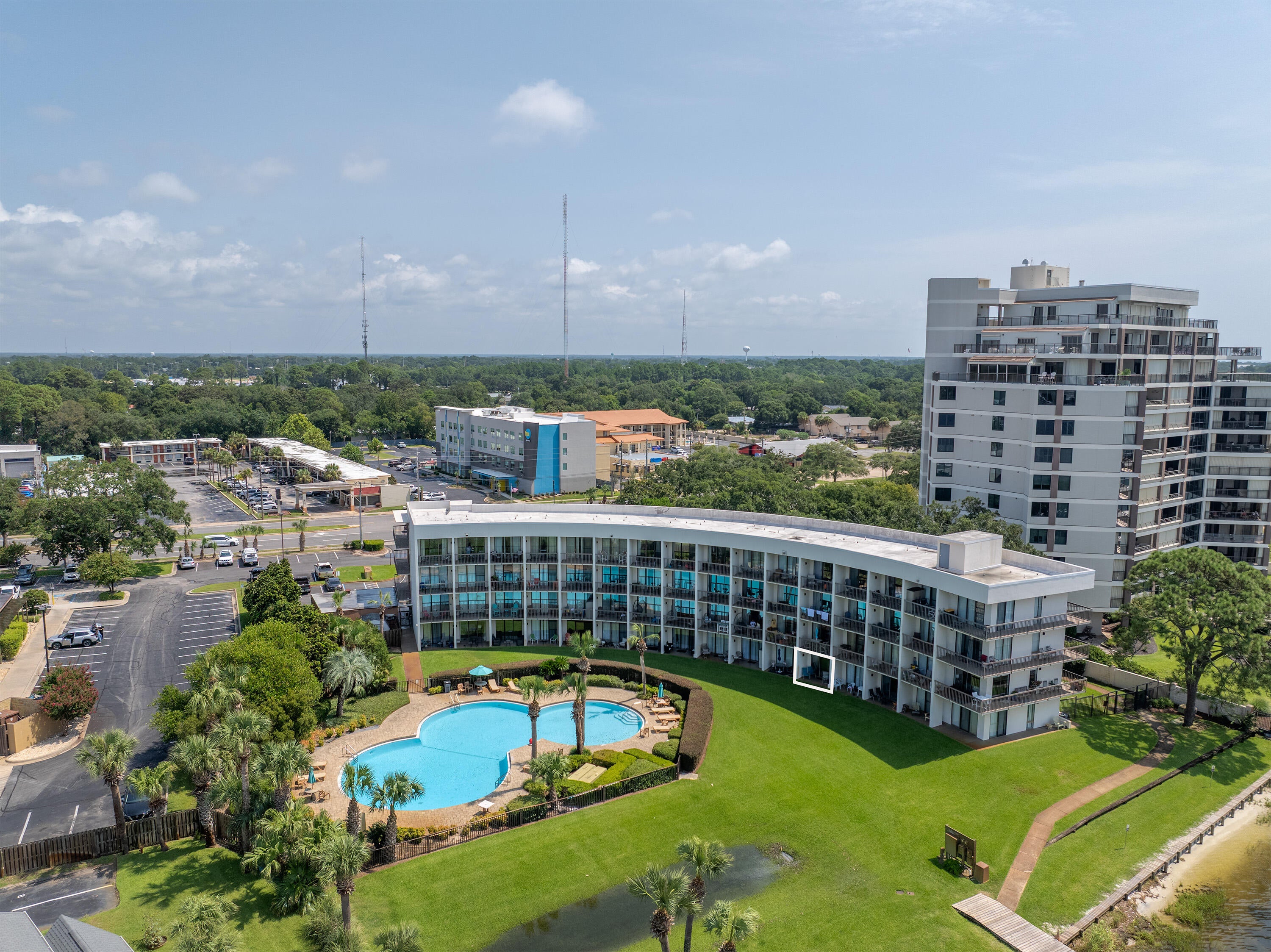 Welcome to and extradordinary slice of coastal paradise at Pirates Bay, where water front living meets effortless luxury on the stunning Santa Rosa Sound. This beautifully furnished first floor condo invites you to experience the Emerald Coast lifestyle at its finest, offering a rare combination of comfort, convenience and breathtaking natural beauty. From the moment you step inside, your greeted by a interior design to compliment your surroundings.The open living space flows seamlessly to your private balcony, where sweeping views of the shimmerring sound, the resort-style, 2 breath taking community pools, and the marina create a daily backdrop that feels more like a vacation every day. Mornings begin with  gentle breezes off the water and evenings end with unforgettable sunsets.The exceptional condo includes a boat slip, a highly sought after feature that elevates this property, into a boaters dream come true. Each floor comes with its own laundryroom. A elevator will take you to the other floors to visit guests or family. Pirates Bay is located in the heart of Fort Walton Beach Fl. The condo is minutes from the sugar white beaches of Okaloosa Island. Close to Eglin and Hurlbert Field. Property has strong rental potential Excellent for investors, military, traveling professional or your place to call home.This condo is a gem.The HOA fees cover a wide range of conveniences, including: Exterior insurance Groundskeeping & maintenance Cable TV & Wi-Fi Trash service Water & sewe