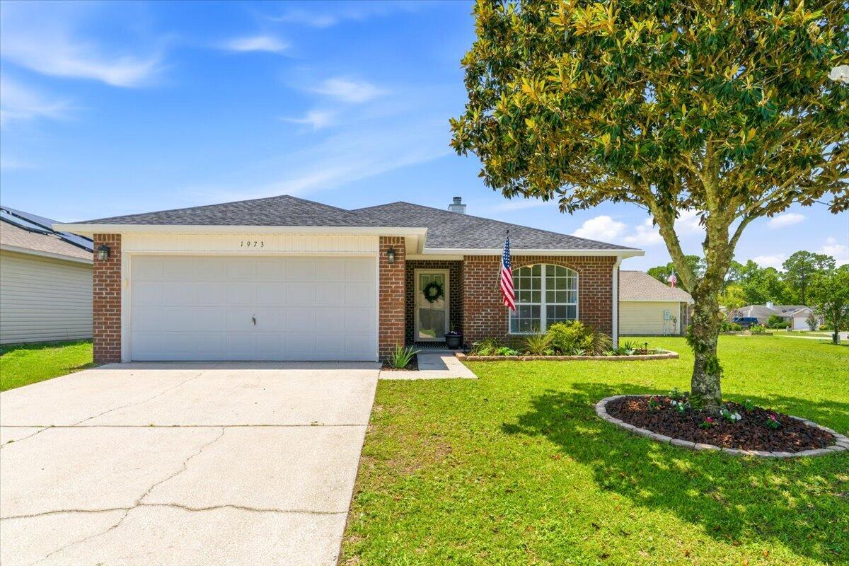 Welcome home to this beautifully refreshed, move-in-ready gem in the heart of Navarre! Situated on a spacious corner lot, this charming home offers the perfect combination of comfort, style, and convenience. Fresh paint throughout, a pressure-washed exterior, refreshed landscaping and a 2024 Roof/HVAC, 2022 Hot Water Heater means all the hard work has already been done for you.

Inside, you'll find timeless tile in the main living spaces and LVP flooring in the bedrooms (no carpet), soaring ceilings, a fireplace, a massive bar and an open floor plan designed for both everyday living and entertaining. The spacious living area flows seamlessly into the dining and kitchen space, creating the perfect gathering place for friends and family.

The primary suite is a private retreat featuring double-door entry, a large walk-in closet, dual vanities, a soaking tub, and a private water closet. Start your mornings with coffee on the screened porch and unwind in the evenings by the cozy fireplace.

No HOA! Resting on approximately 0.19 acres, the corner lot offers plenty of outdoor space and the potential for boat or RV parking. Centrally located just minutes from Navarre's sugar-white beaches, shopping, dining, schools, and local favorites, this home puts the best of the Florida lifestyle right at your doorstep.

Whether you're searching for a primary residence, second home, or investment property, this move-in-ready beauty is one you won't want to miss. Schedule a private tour today!