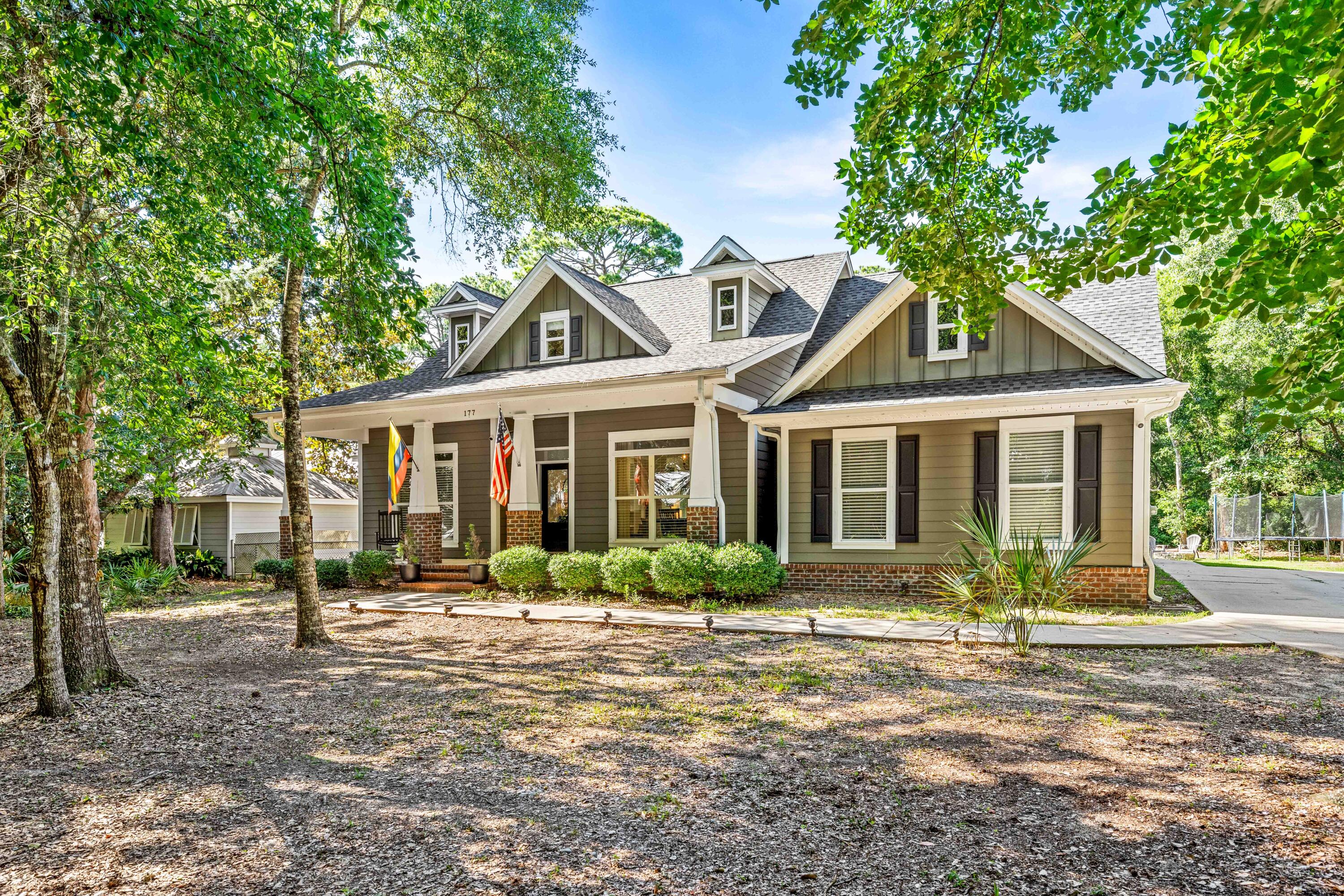 $10,000 credit towards closing costs, New roof (2022). New HVAC (2025). All new plumbing (2025). Custom-built forever home. Attention Veterans!! Assumable VA rate, 2.75%.

Located in one of the most beautiful private cul-de-sacs in SRB with only 27 home sites. The street is filled with Florida cottage charm, defining ''Old Florida.''

The home includes a bonus room, an oversized front porch, gorgeous columns, and low maintenance hardy plank siding. 10' smooth ceilings, deep crown molding, custom cabinetry, granite countertops, and built-in bookshelves are just a few of the many upgrades. The upstairs is finished out to be the ultimate playroom for the kids, extra sleeping, or office space. The backyard is primed and ready for a pool or garage.