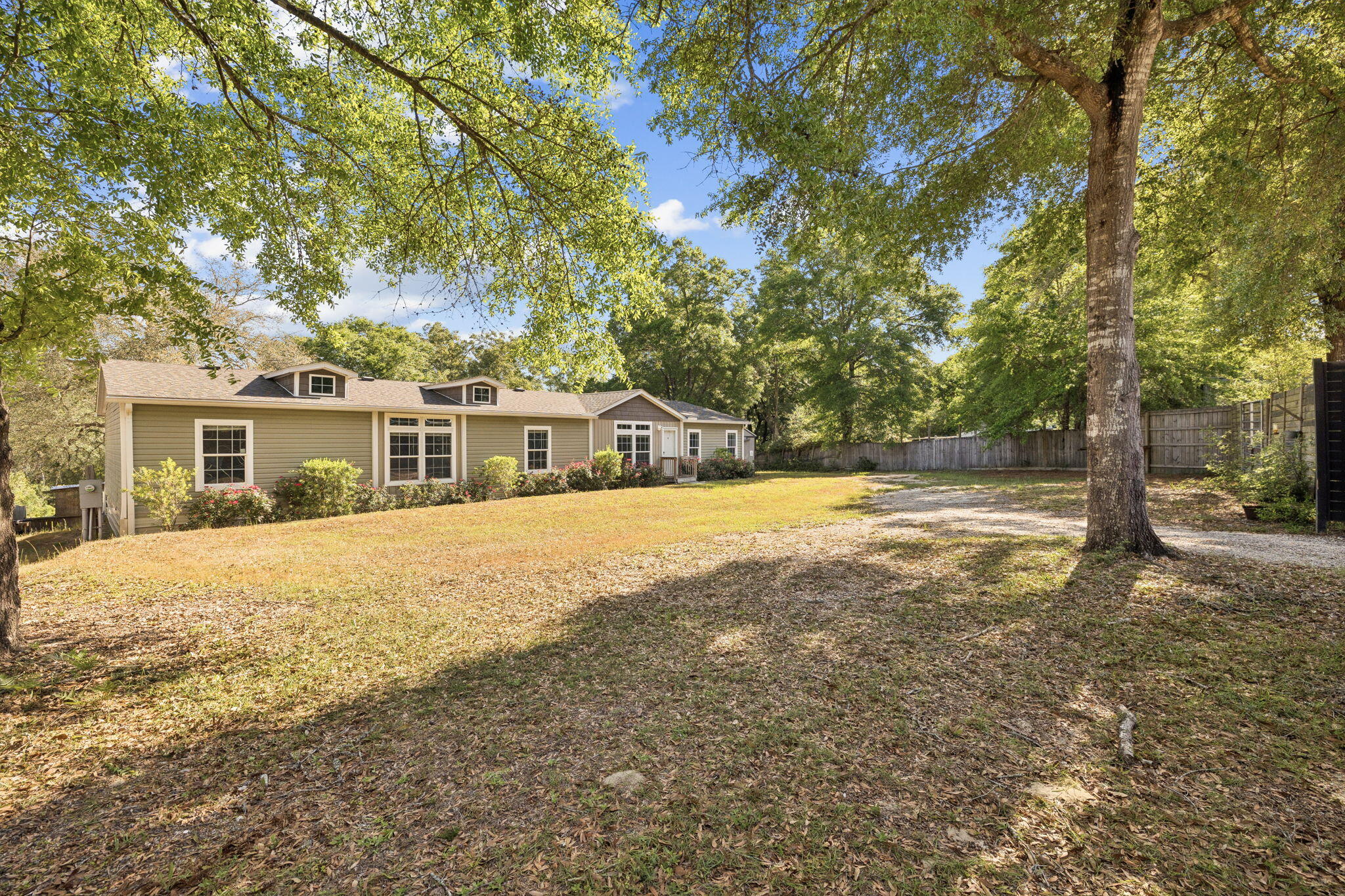Welcome to your private waterfront escape in the heart of Freeport. Situated on two oversized lots with approximately 210 feet of creek frontage and direct access to Choctawhatchee Bay, this 2020-built home offers the perfect blend of space, comfort, and outdoor lifestyle.

Inside, you'll find over 2,200 square feet of thoughtfully designed living space featuring 4 bedrooms and 2 full bathrooms. The open layout includes both a formal living room and a spacious great room complete with a fireplace and built-in entertainment center--ideal for hosting family and friends. The kitchen is a standout, featuring granite countertops, stainless steel appliances, a farmhouse sink, kitchen island, and a barn-door pantry for added character and functionality.