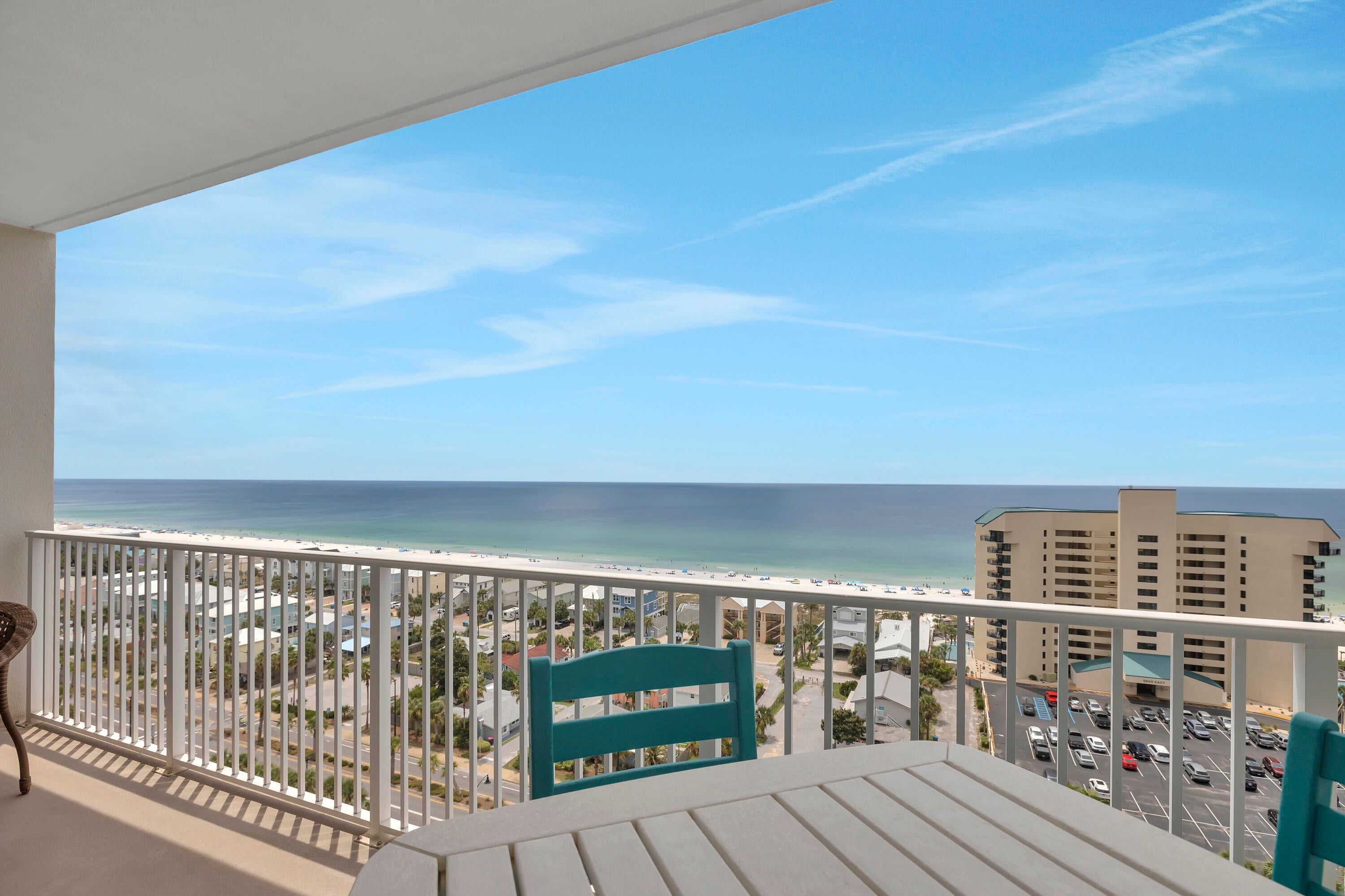 HIGH FLOOR. LOW STACK. BIG VIEWS.
This 13th-floor unit near the southeast end of Laketown Wharf offers stunning Gulf views from the living room and balcony, plus peaceful golf course and lagoon views from the front entry. Located in the desirable fourth stack—close to the elevator but away from heavy foot traffic—this 1-bedroom, 2-bath condo also includes a dedicated bunk area with a double bed on the bottom bunk, comfortably accommodating up to six.

Used exclusively as a vacation home by the current owners, this condo has not been rented under their ownership. The excellent condition reflects the care and maintenance consistent with non-rental occupancy, along with thoughtful updates that have preserved its like-new feel. With 9-foot ceilings, 1,047 square feet of well-maintained space, and being sold fully furnished and turnkey, it's ready for immediate enjoyment.

Enjoy resort-style living with access to five pools (one heated year-round), two hot tubs, a gym with Gulf views, mini-golf, kids' playground, and gated beach access right next to Pineapple Willy's. The 52,000 sqft lakefront boardwalk features a nightly fountain and light show, and the ground level is home to Juan Tacoone of PCB's best-kept culinary secrets. Reasonable HOA dues include water, sewer, cable/TV, pest control, and more.

All information is deemed reliable but should be verified by the buyer if important.